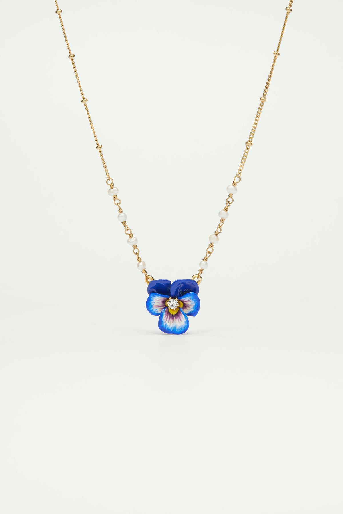 Collier pendentif pensée bleue et cristal taillé