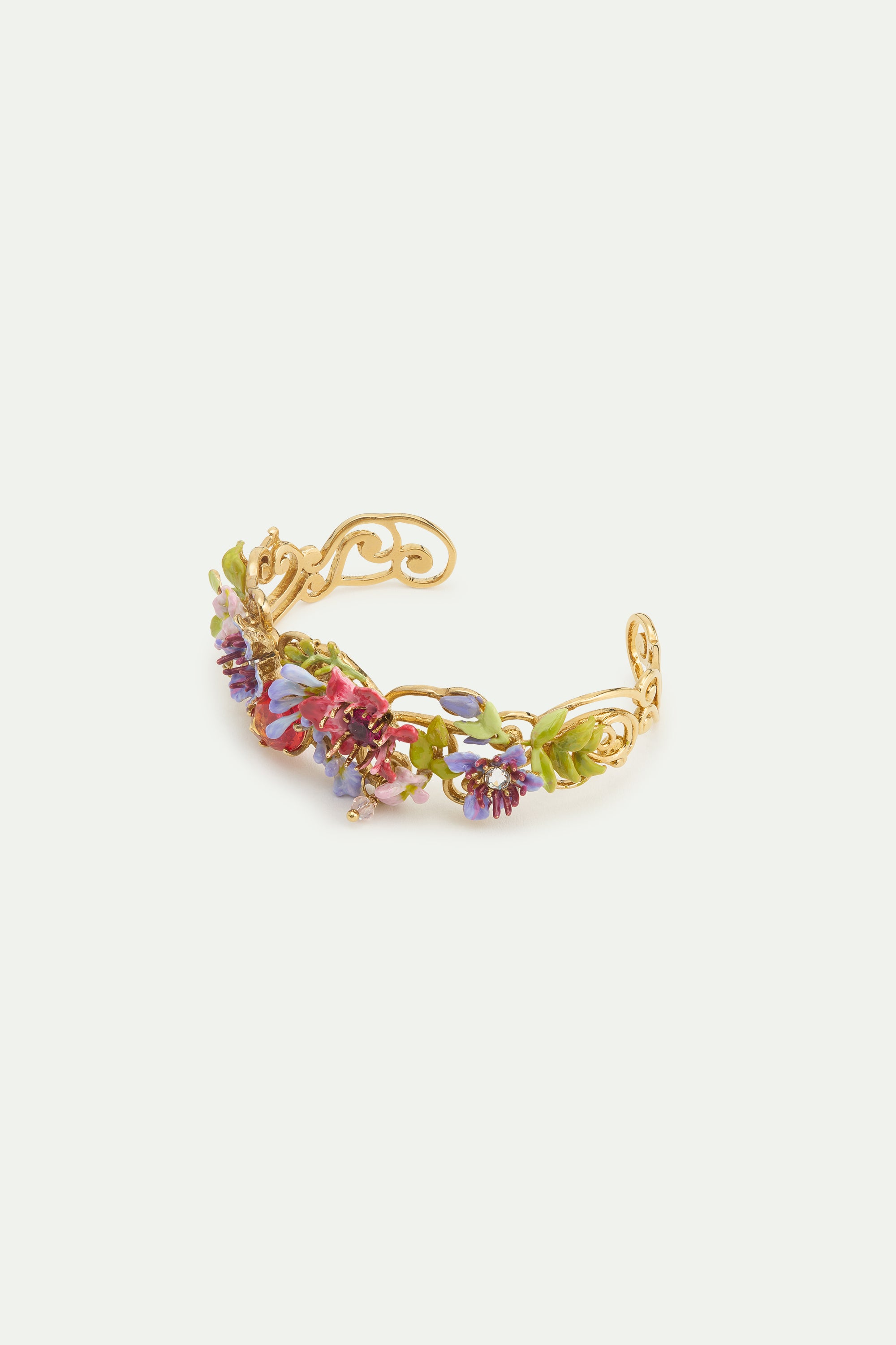 Cuff bracelet with pink and purple arabesque, ivy, pink and purple clematis, and two-tone faceted glass.