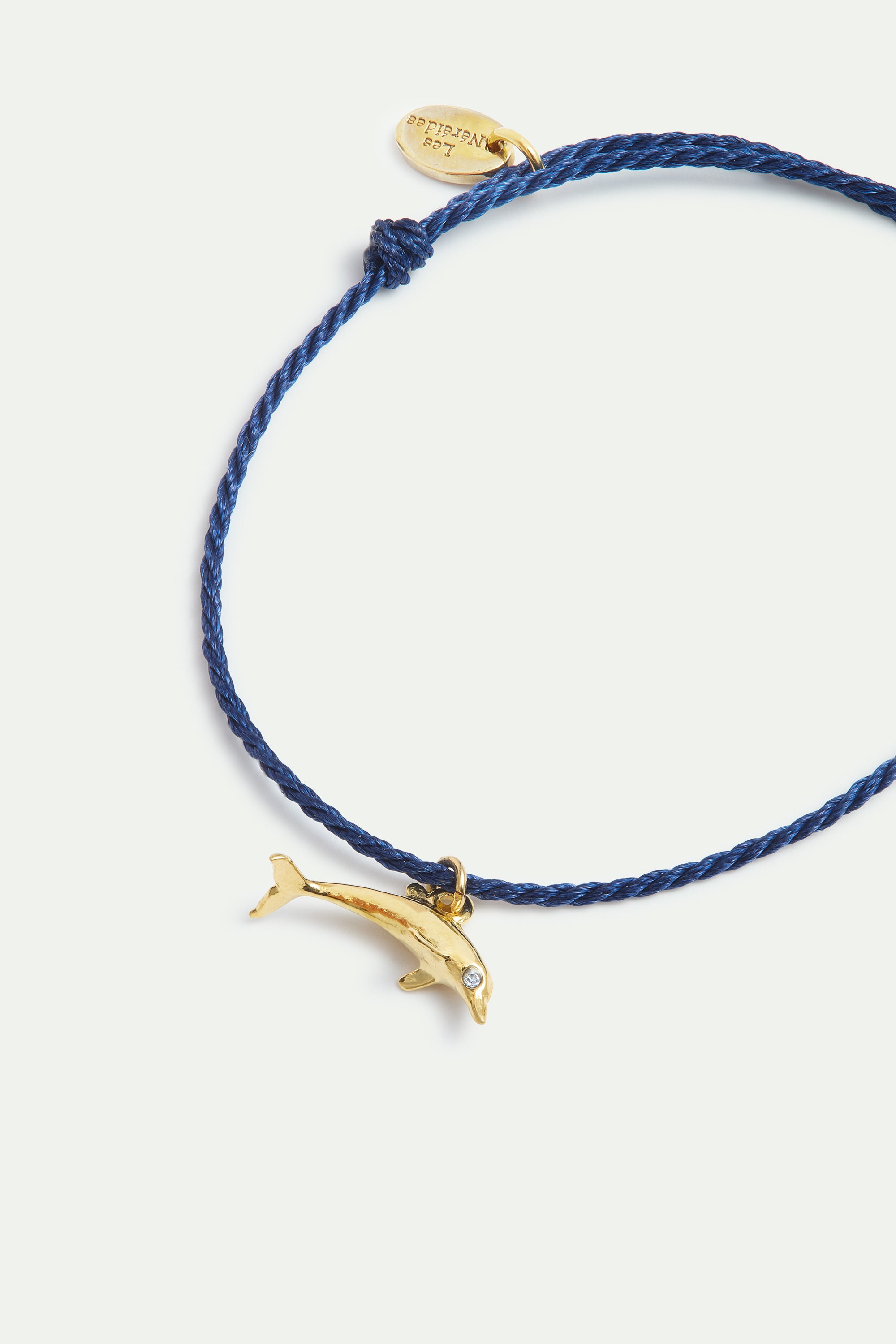 Bracelet corde bleue dauphin doré