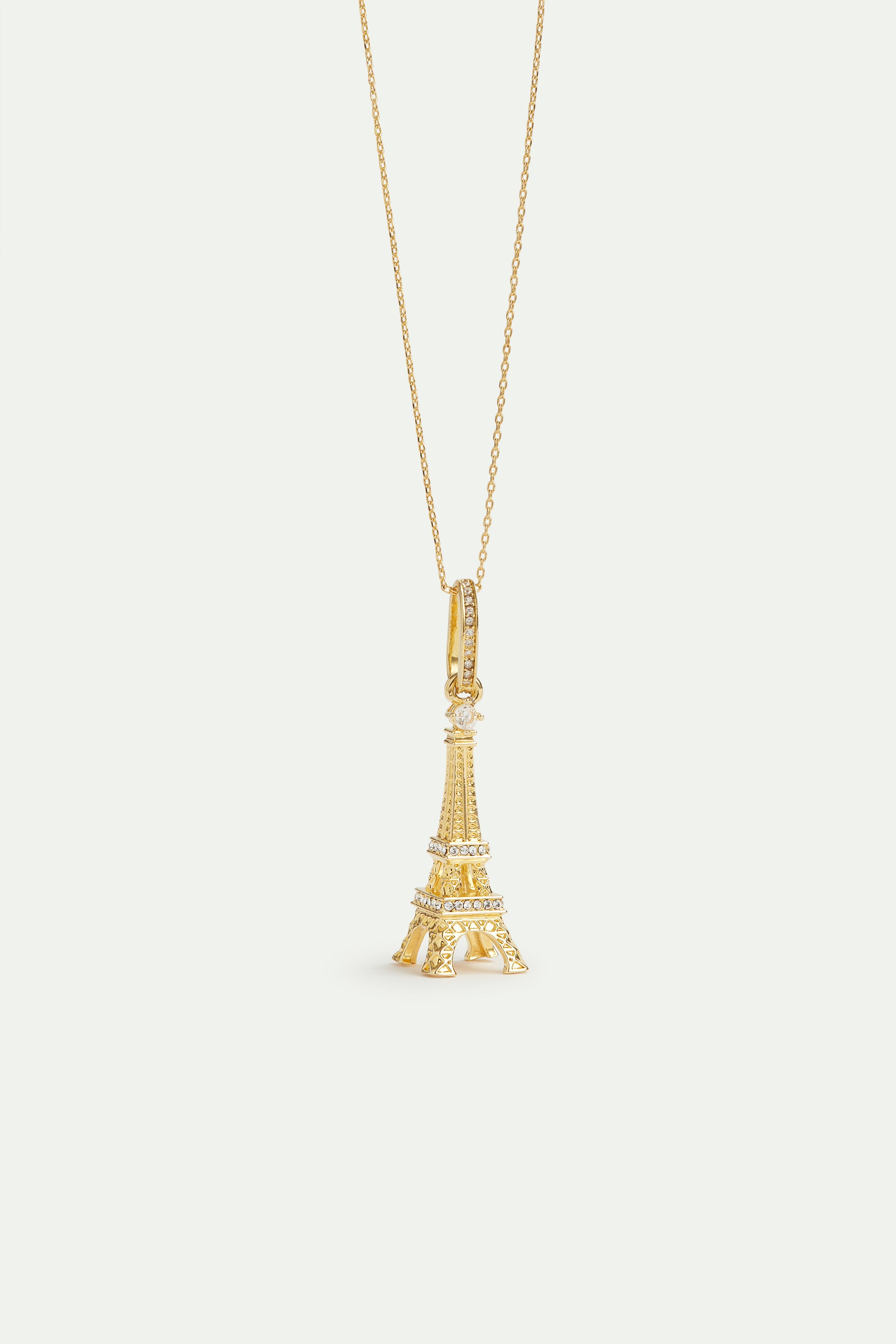 Pendentif Tour Eiffel dorée, Ingéniosité et Ambition