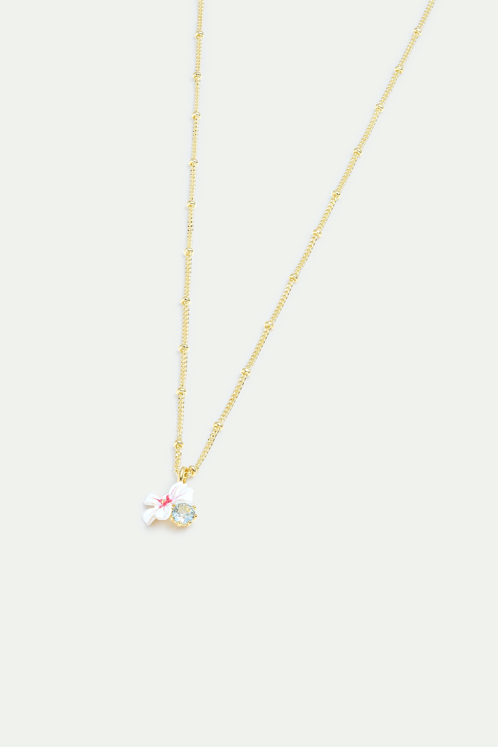 Collier pendentif aubépine blanche et rose et cristal bleu