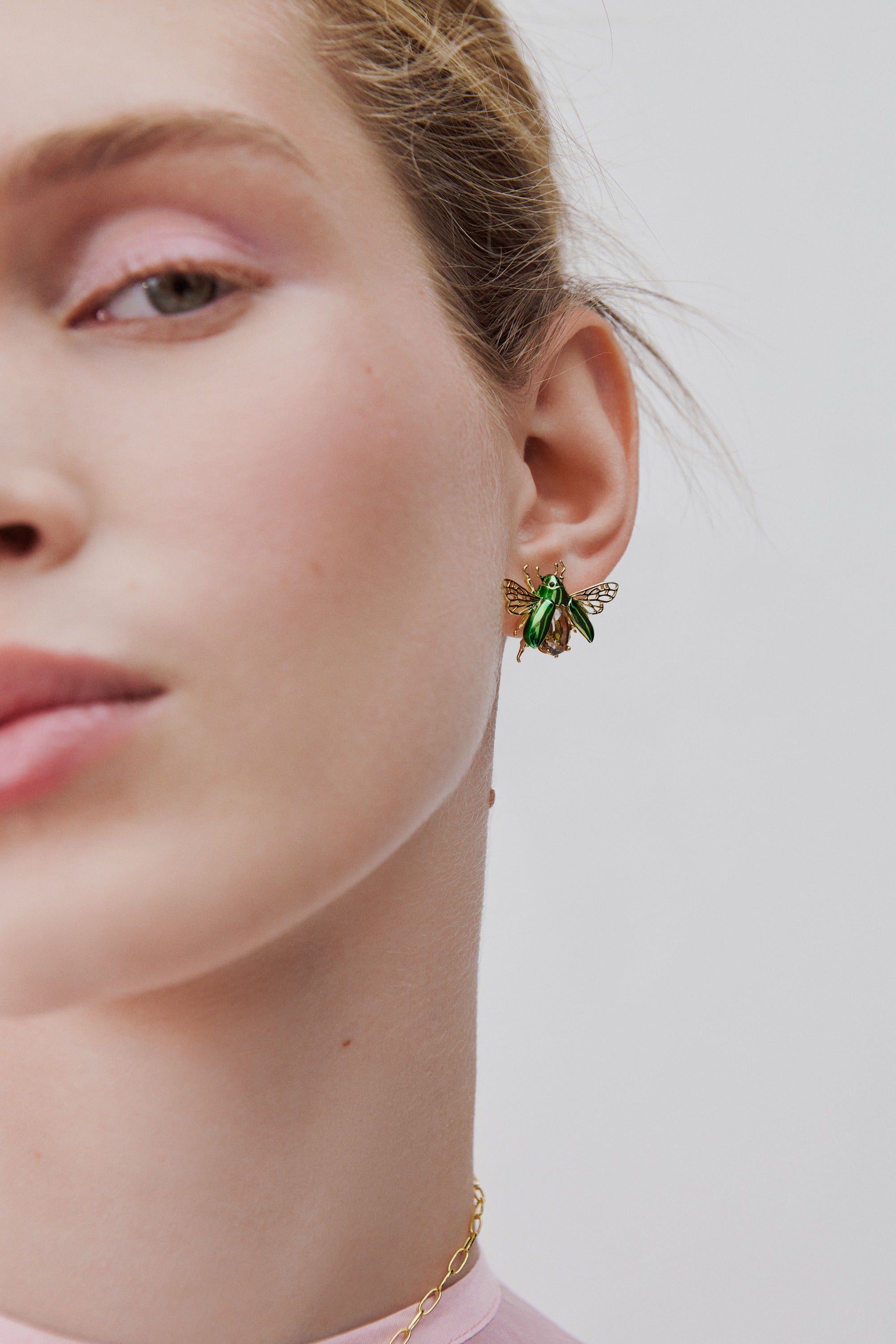 Post earrings with flying green rose chafer and black faceted glass stone