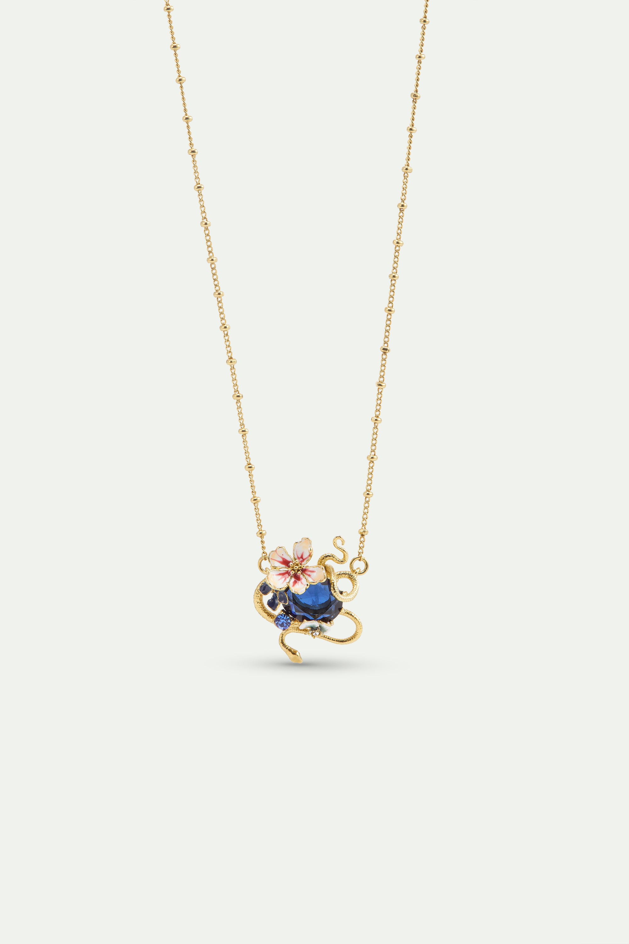 Collier pierre facettée bleue, serpent doré et fleurs de Mauve