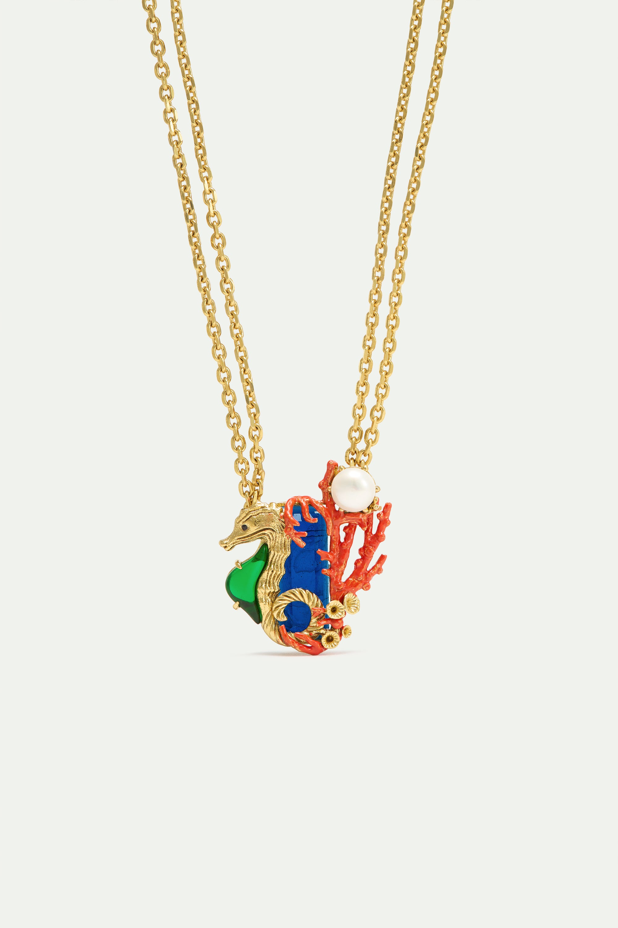 Collier pierre bleu marine et hippocampe vert et doré