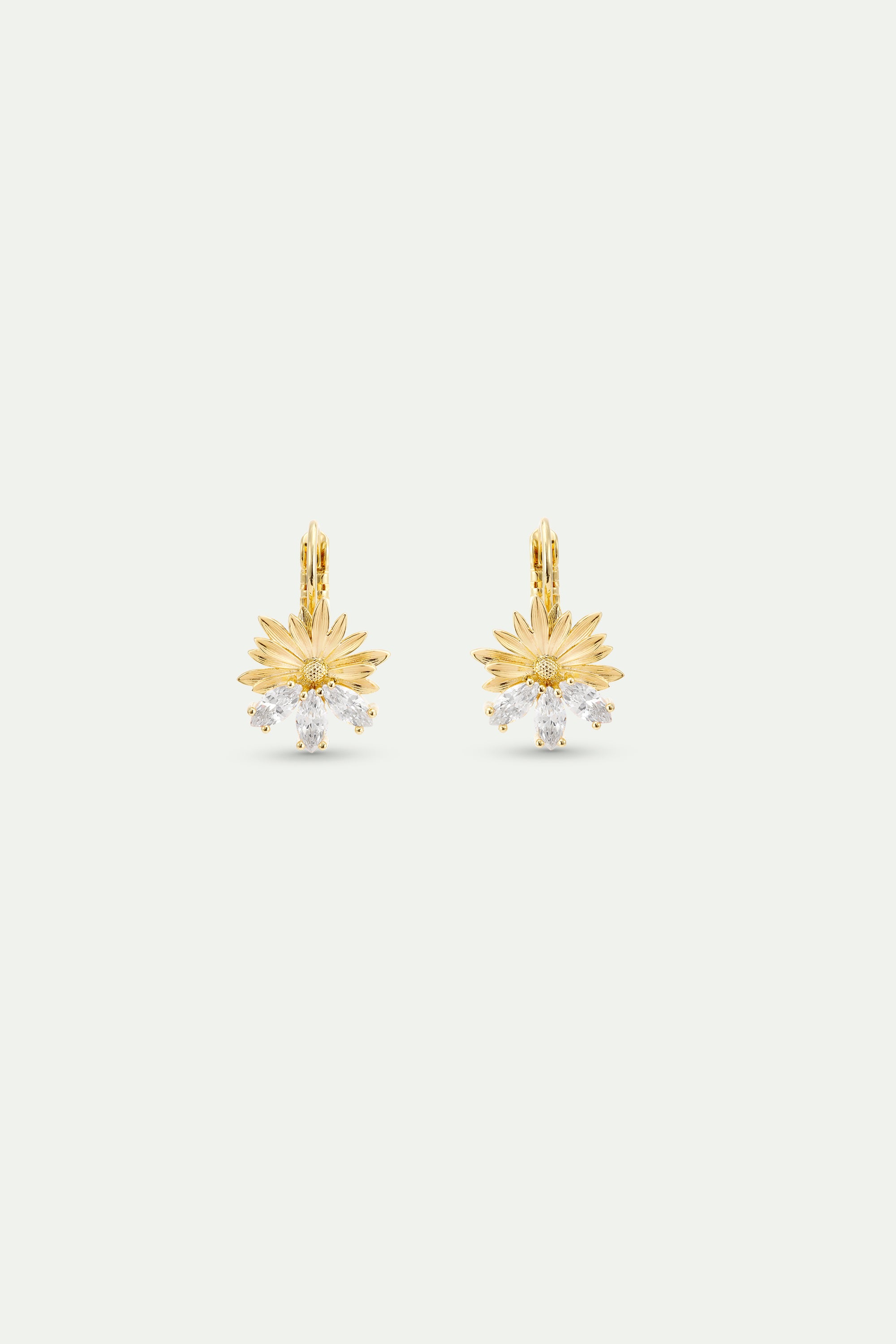 Gold sleeper earrings with daisies and white stones