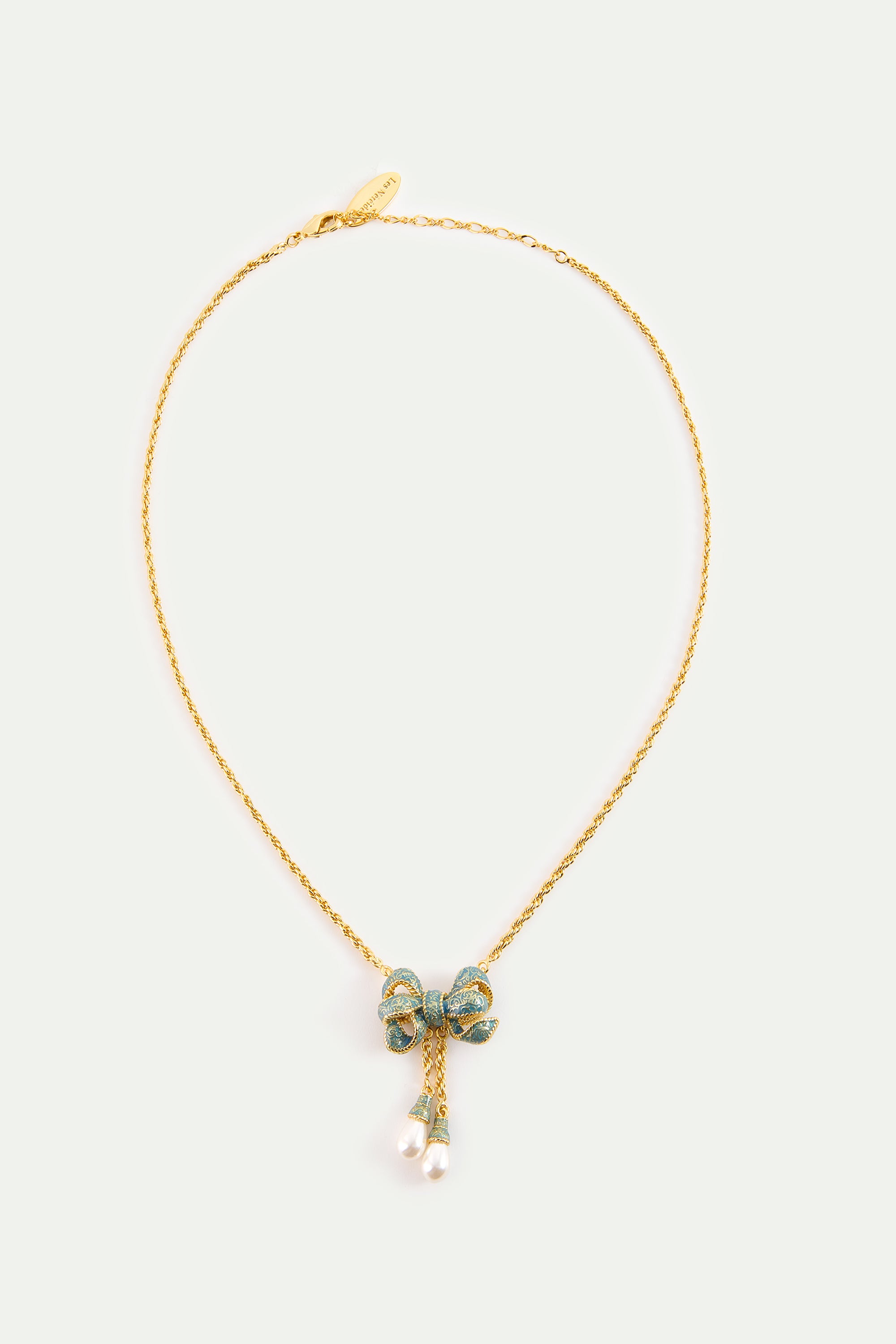 Collier pendentif nœud bleu et perles de culture