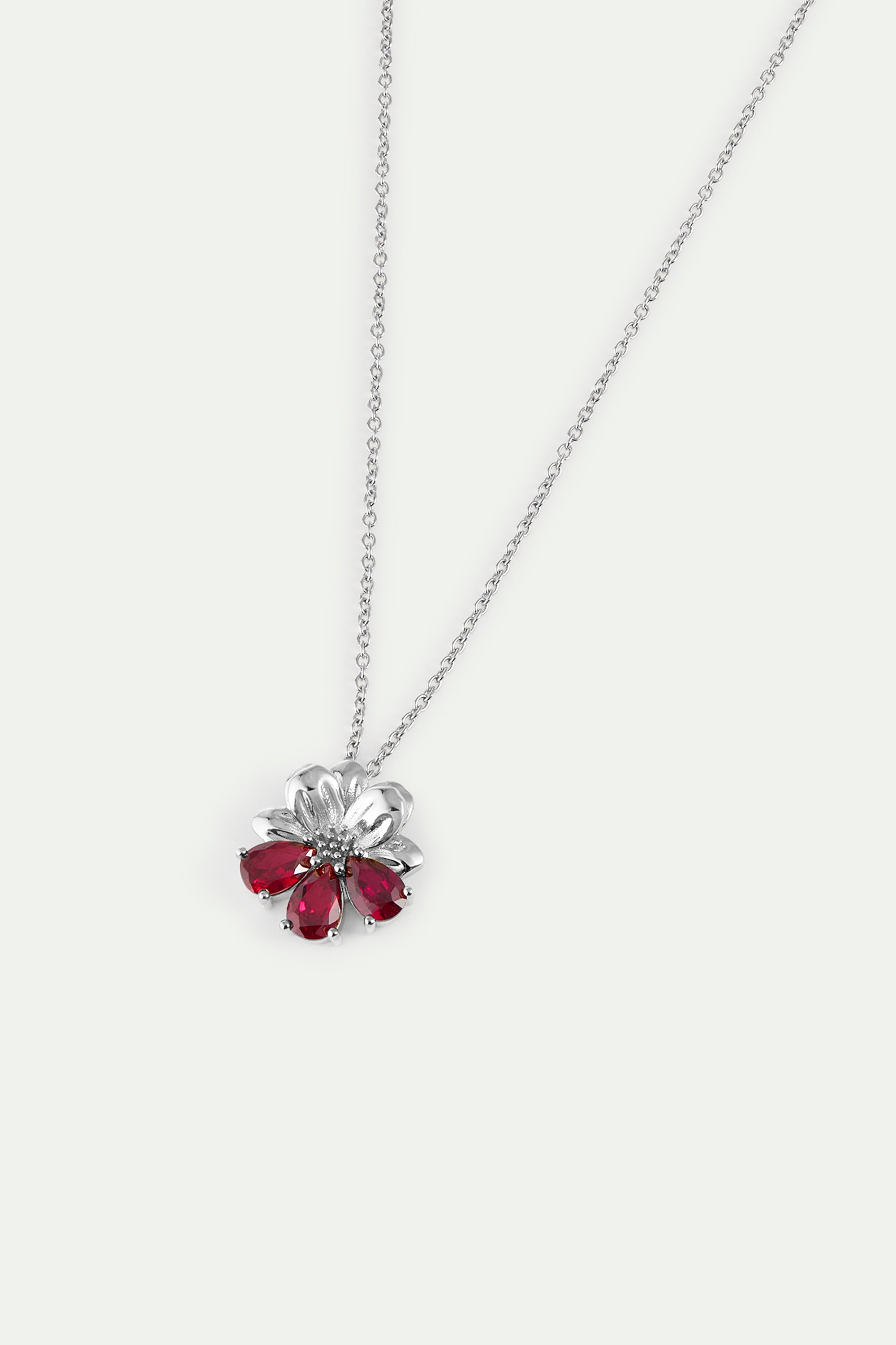 Collier pendentif argenté cosmos et pierres rouges