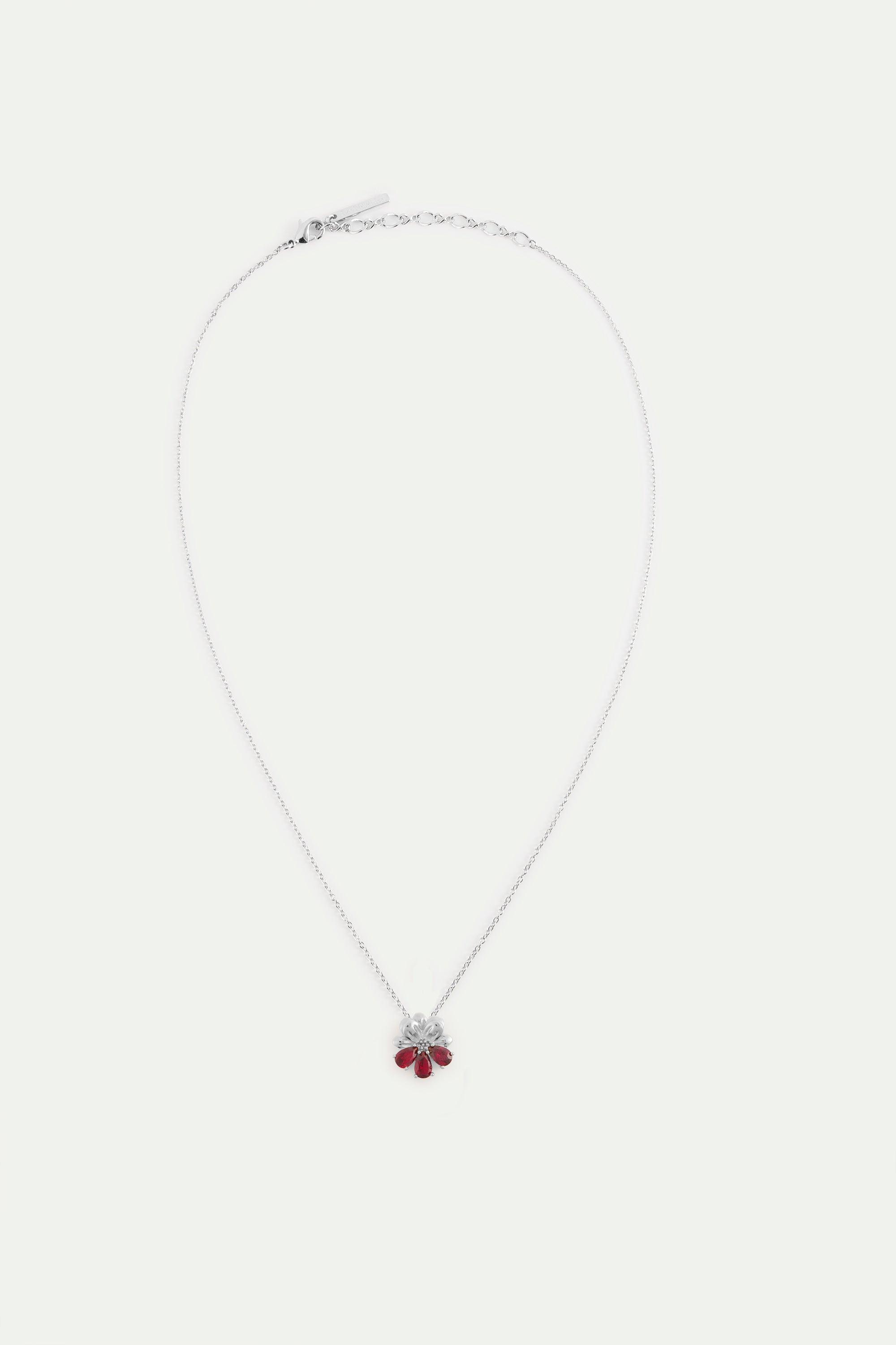 Collier pendentif argenté cosmos et pierres rouges