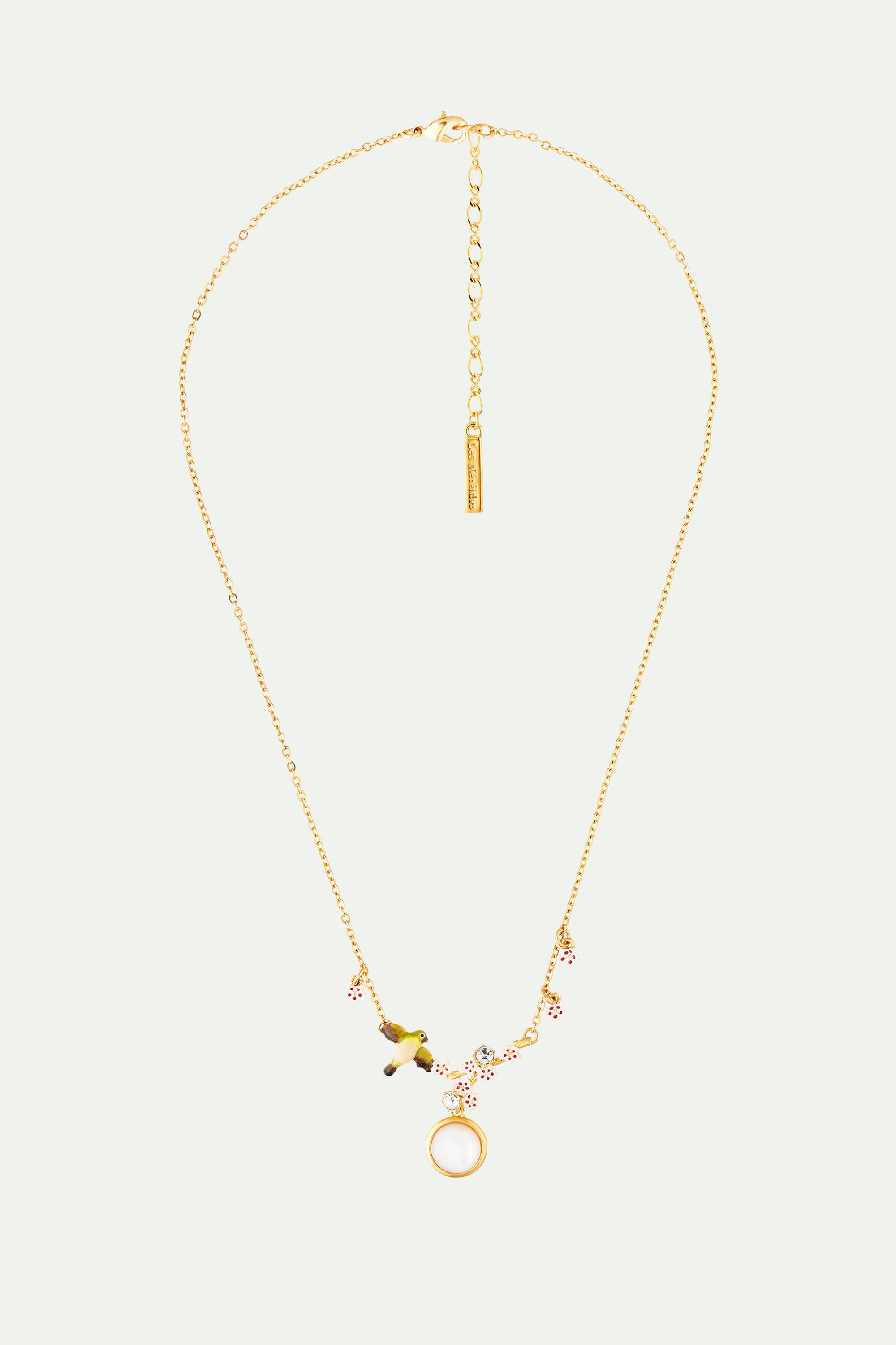 Collier plastron cabochon de nacre, oiseau, fleur de cerisier et cristaux