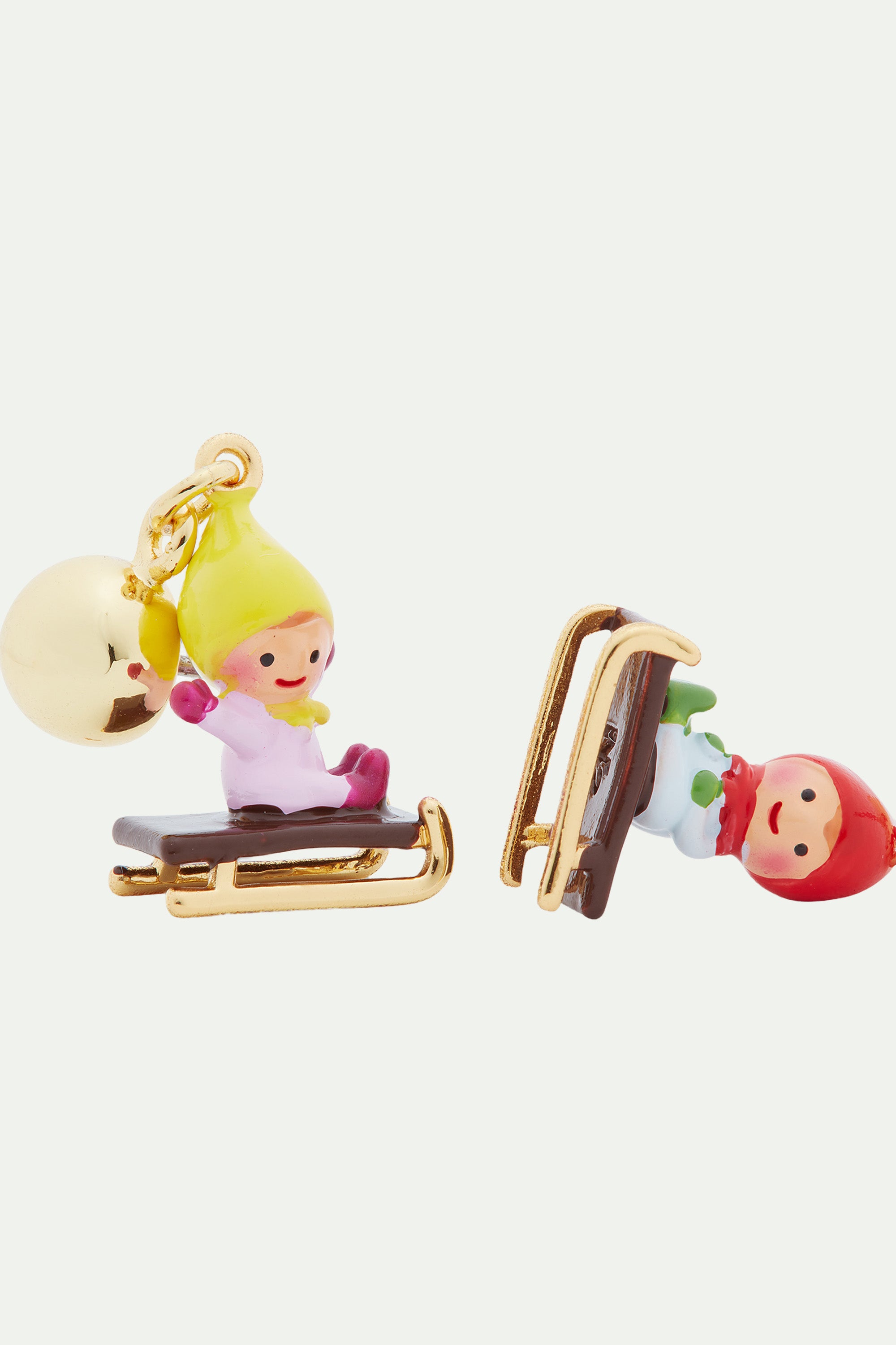Sledging young garden gnome clip-on earrings