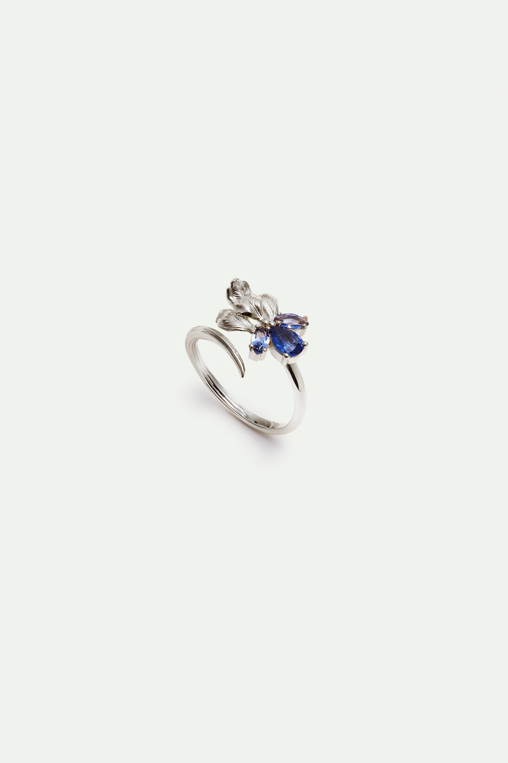 Anillo ajustable iris plateado y piedras azules