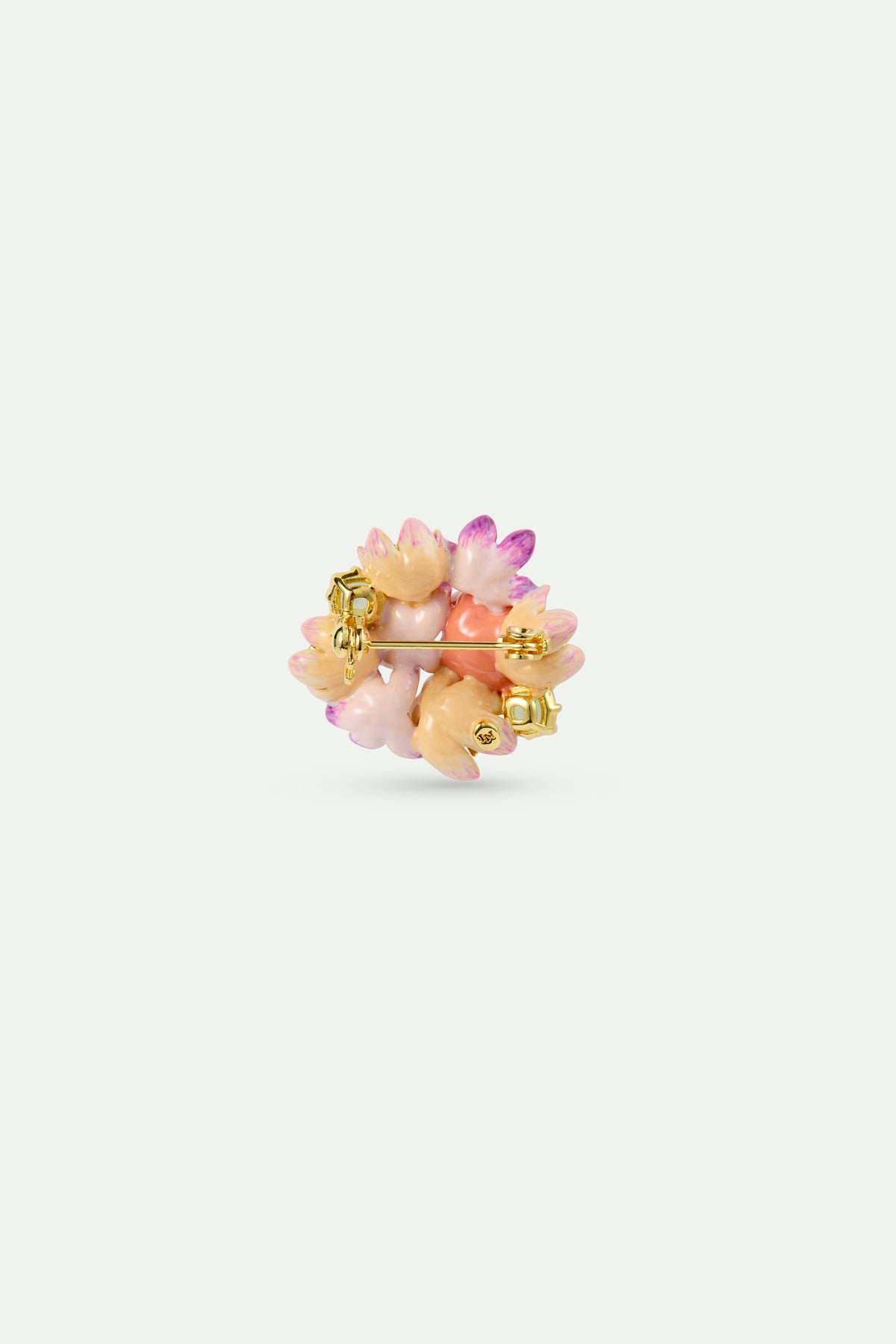 Bouquet of pink hellebores and green stone brooch