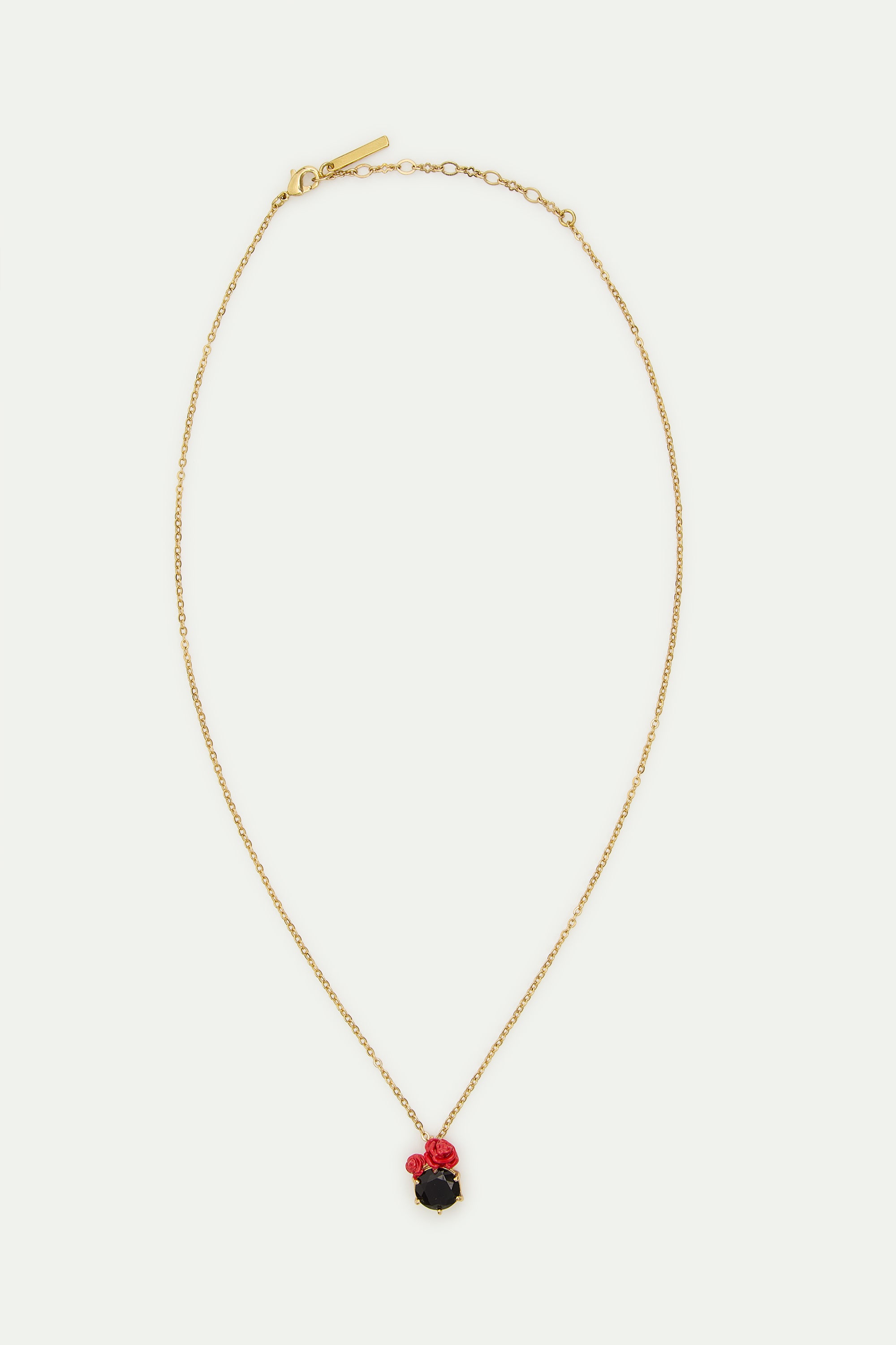 Collier pendentif pierre ronde facettée noire et roses rouges