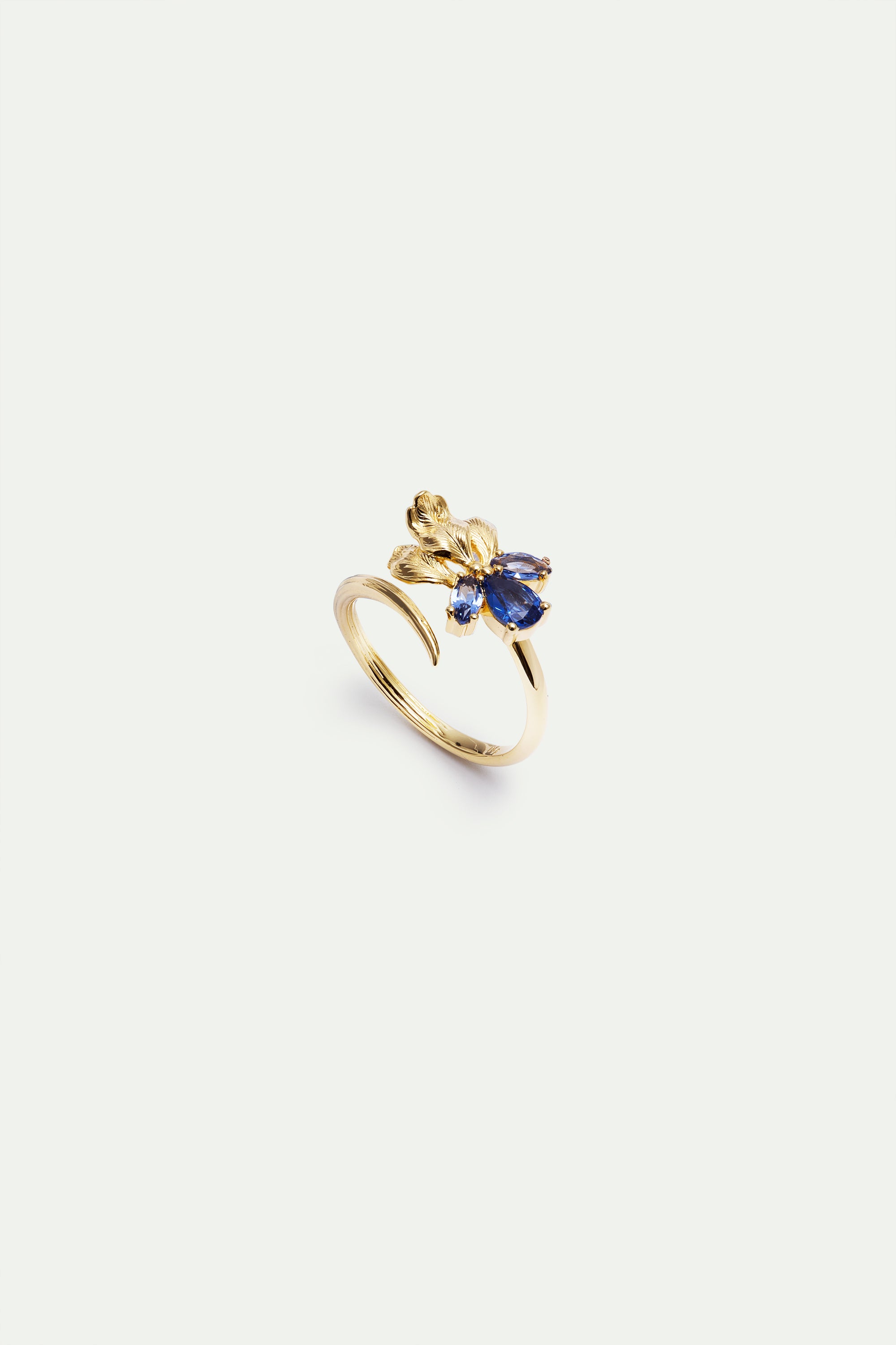 Anillo ajustable dorado iris y piedras azules