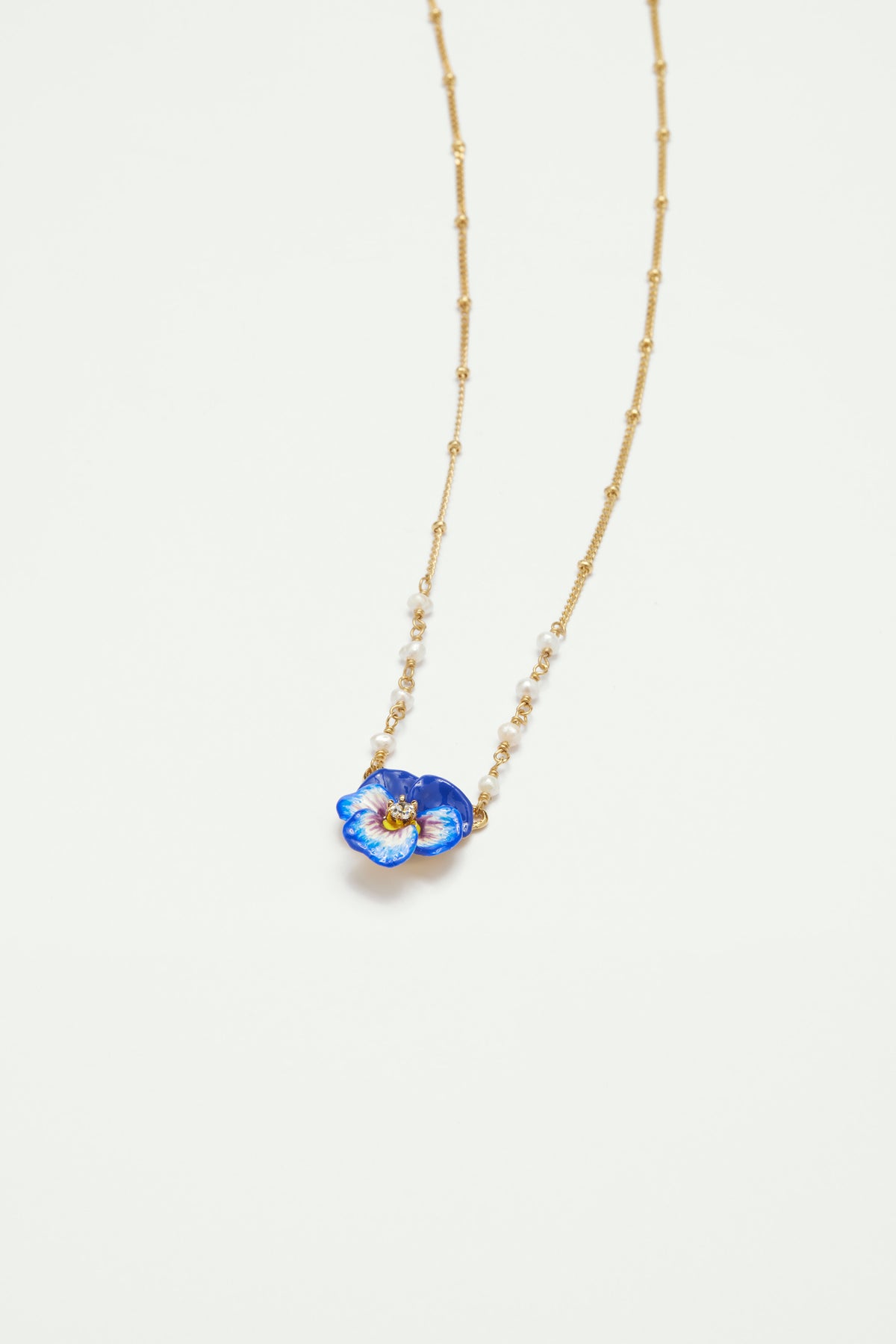 Collier pendentif pensée bleue et cristal taillé