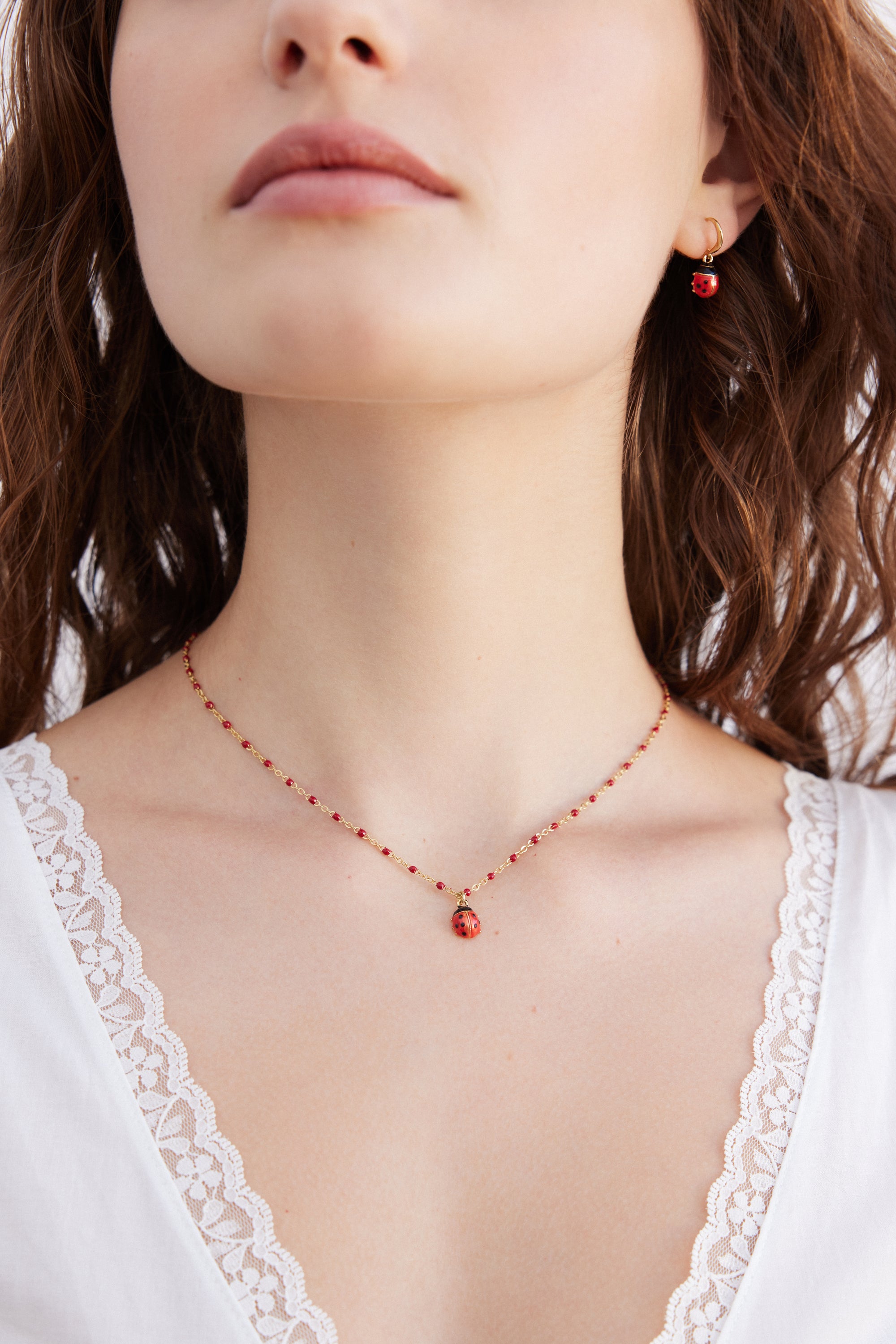 Collier pendentif Coccinelle rouge et noire