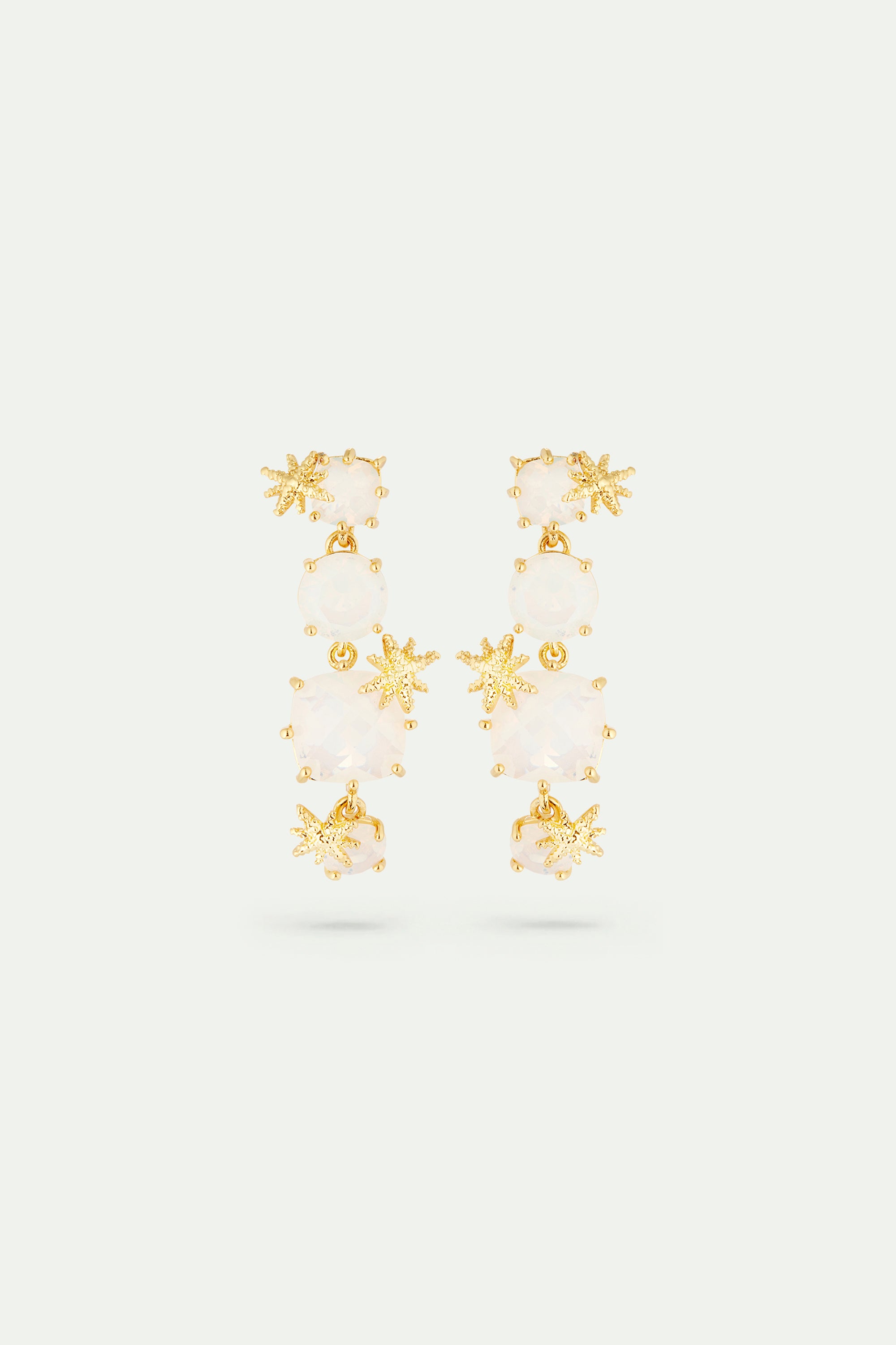 Pendientes La Diamantine con cuatro piedras blancas opalescentes y finas estrellas