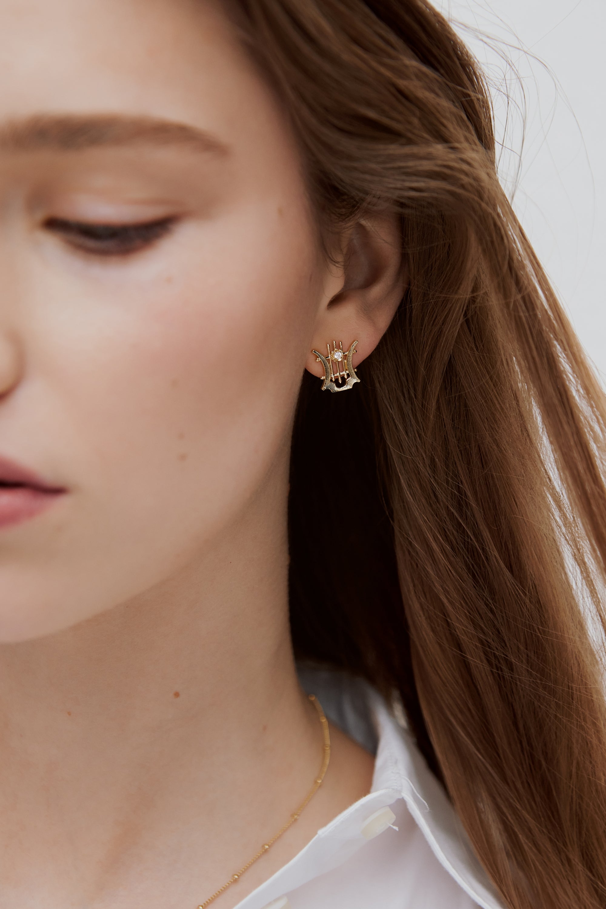 Boucles d'oreilles tiges dorées Lyre