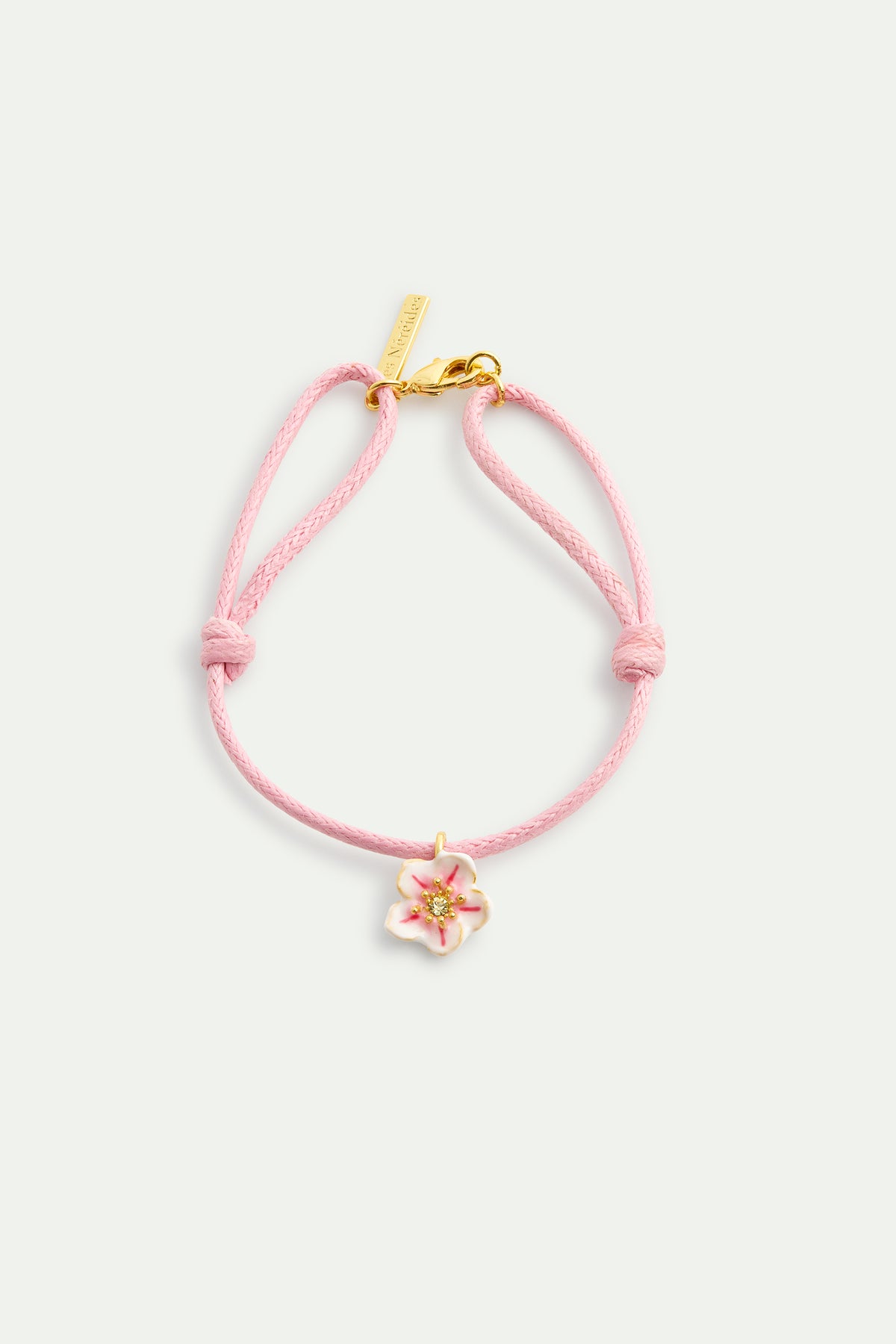 Bracelet cordon rose et mini fleur blanche de cerisier
