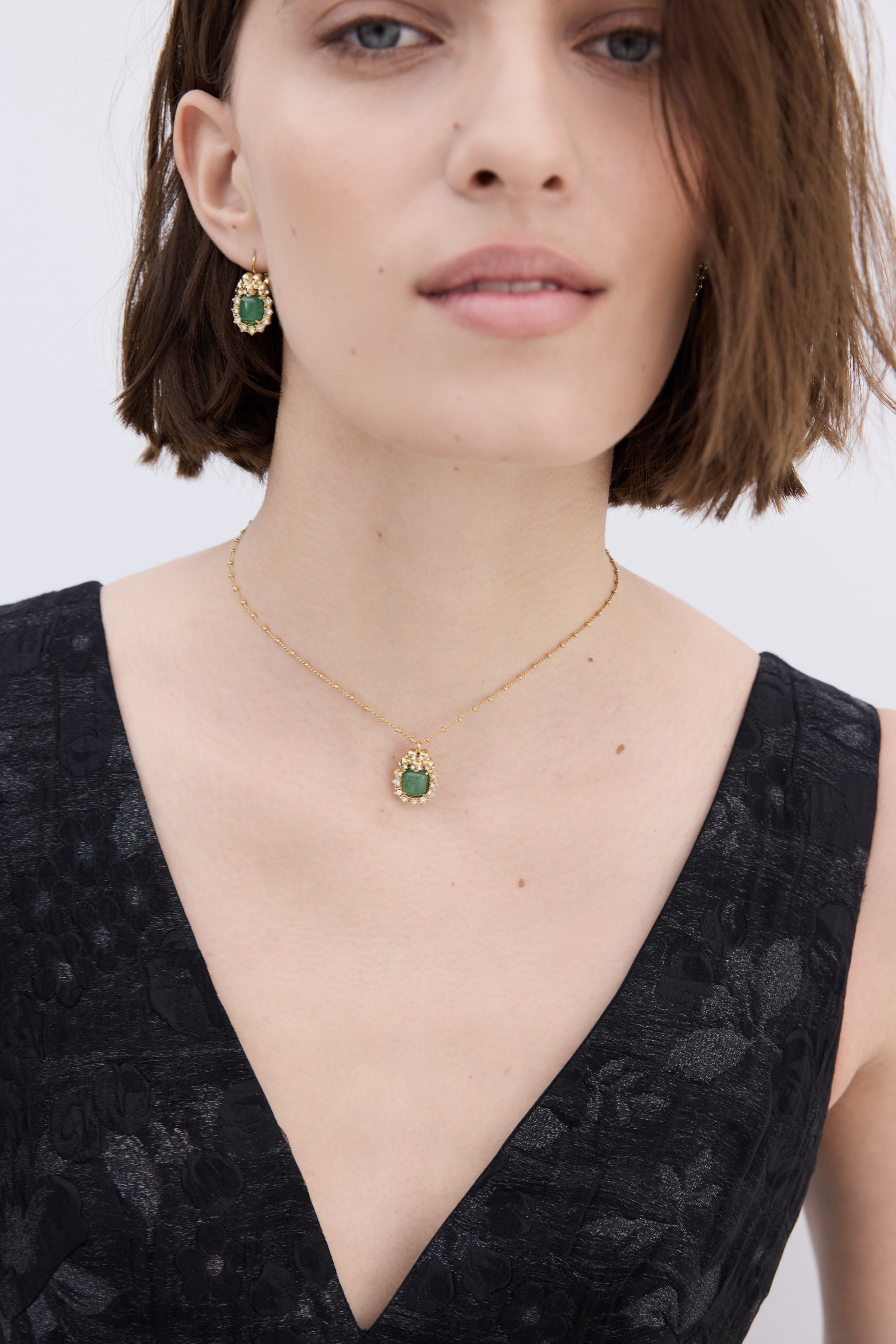 Collier pendentif aventurine verte, crânes et cristaux
