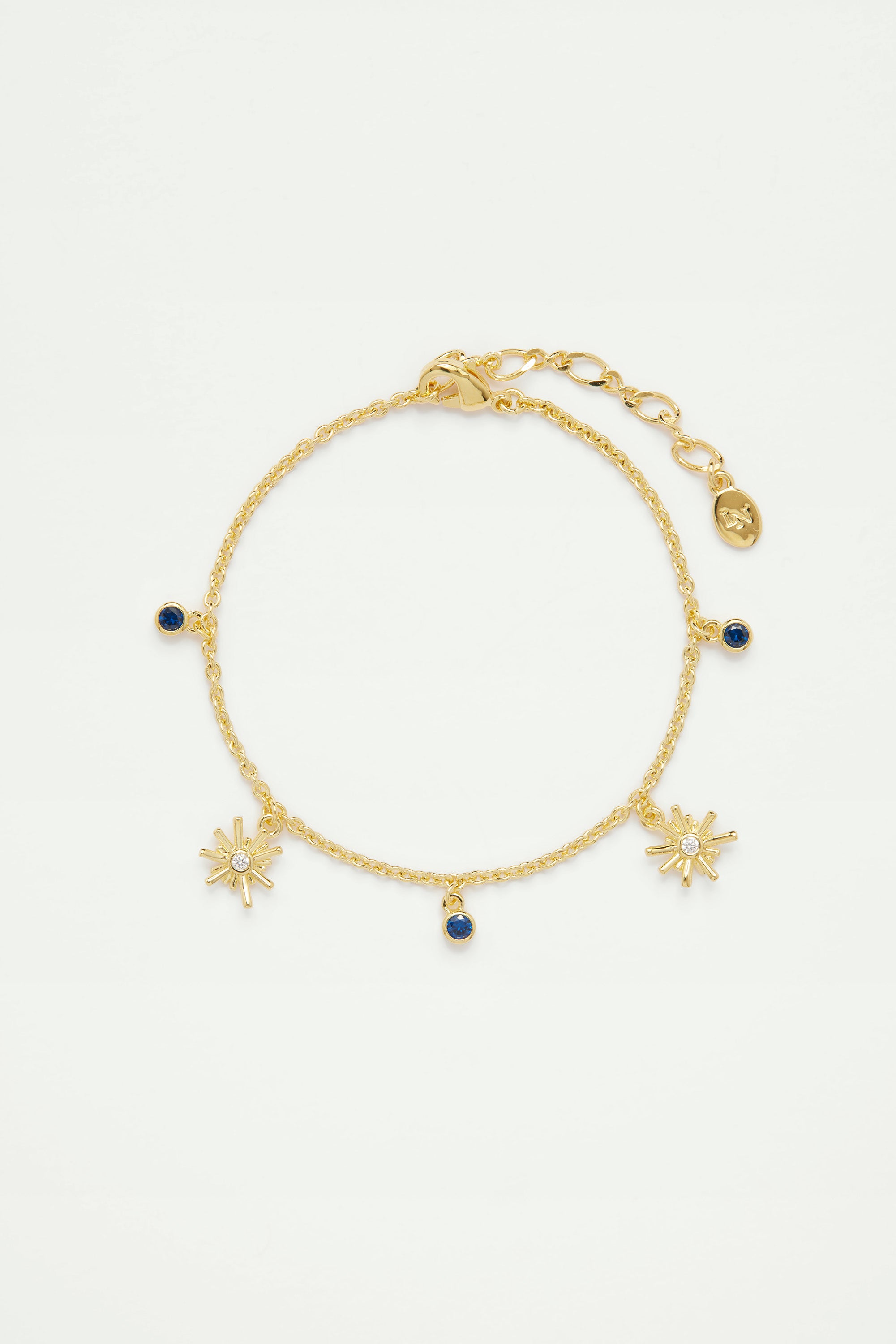 Pulsera charm's estrellas doradas y piedra azul noche
