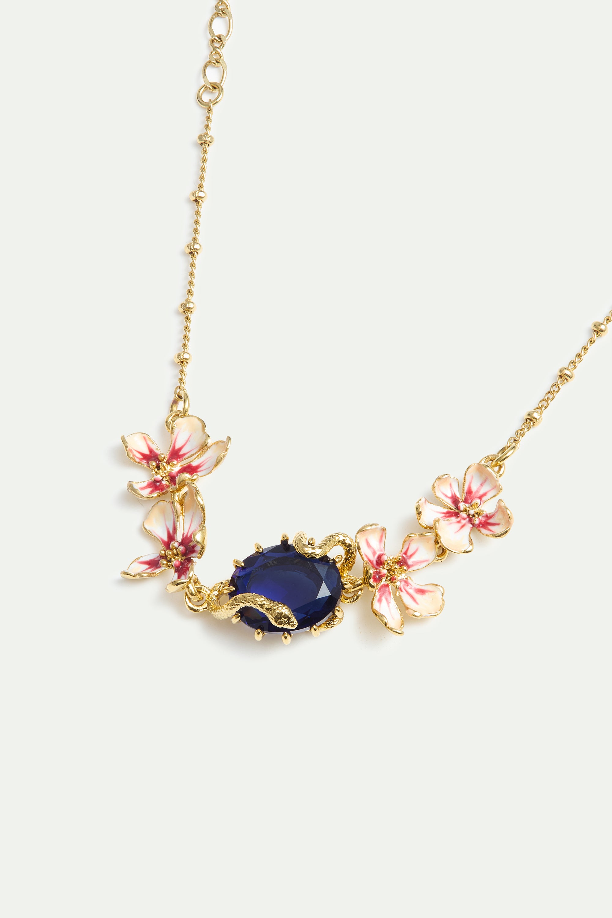 Bracelet pierre facettée bleue, serpent doré et fleurs de Mauve