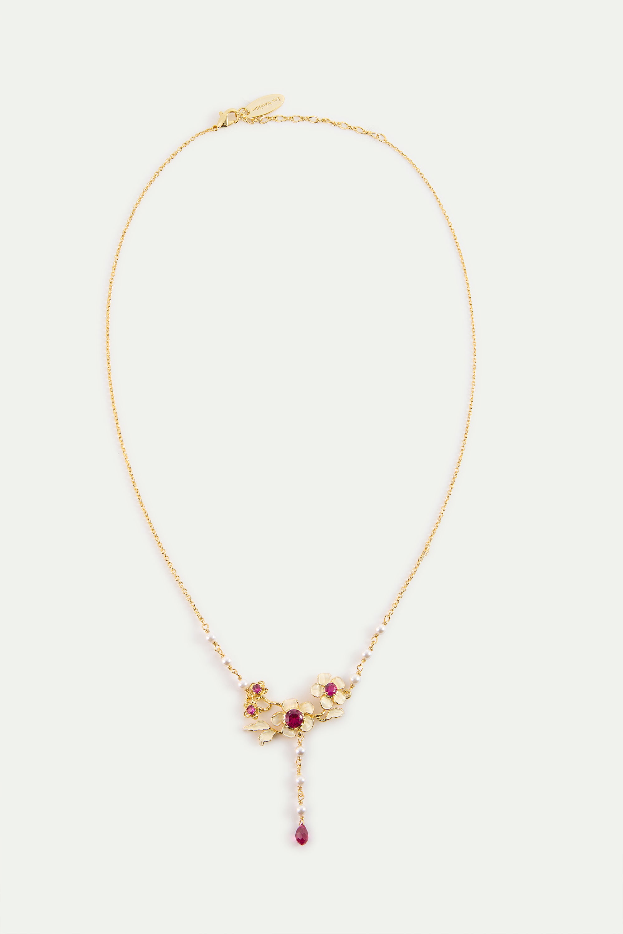 Collier plastron anémones dorées, cristaux roses et perles de culture