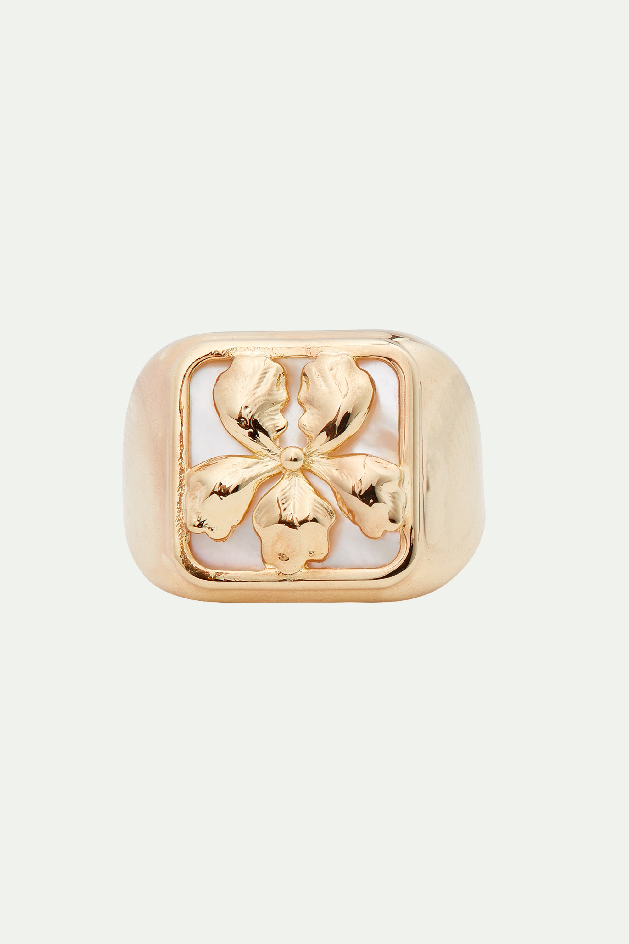Gold iris on mother of pearl plate ring