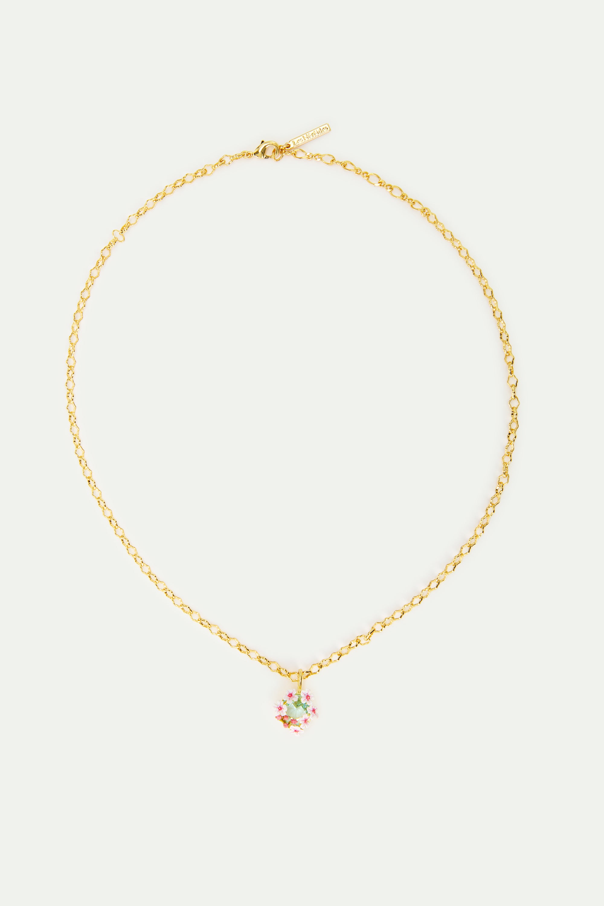 Collier pendentif pierre ronde facettée bleue et aubépines blanches et roses