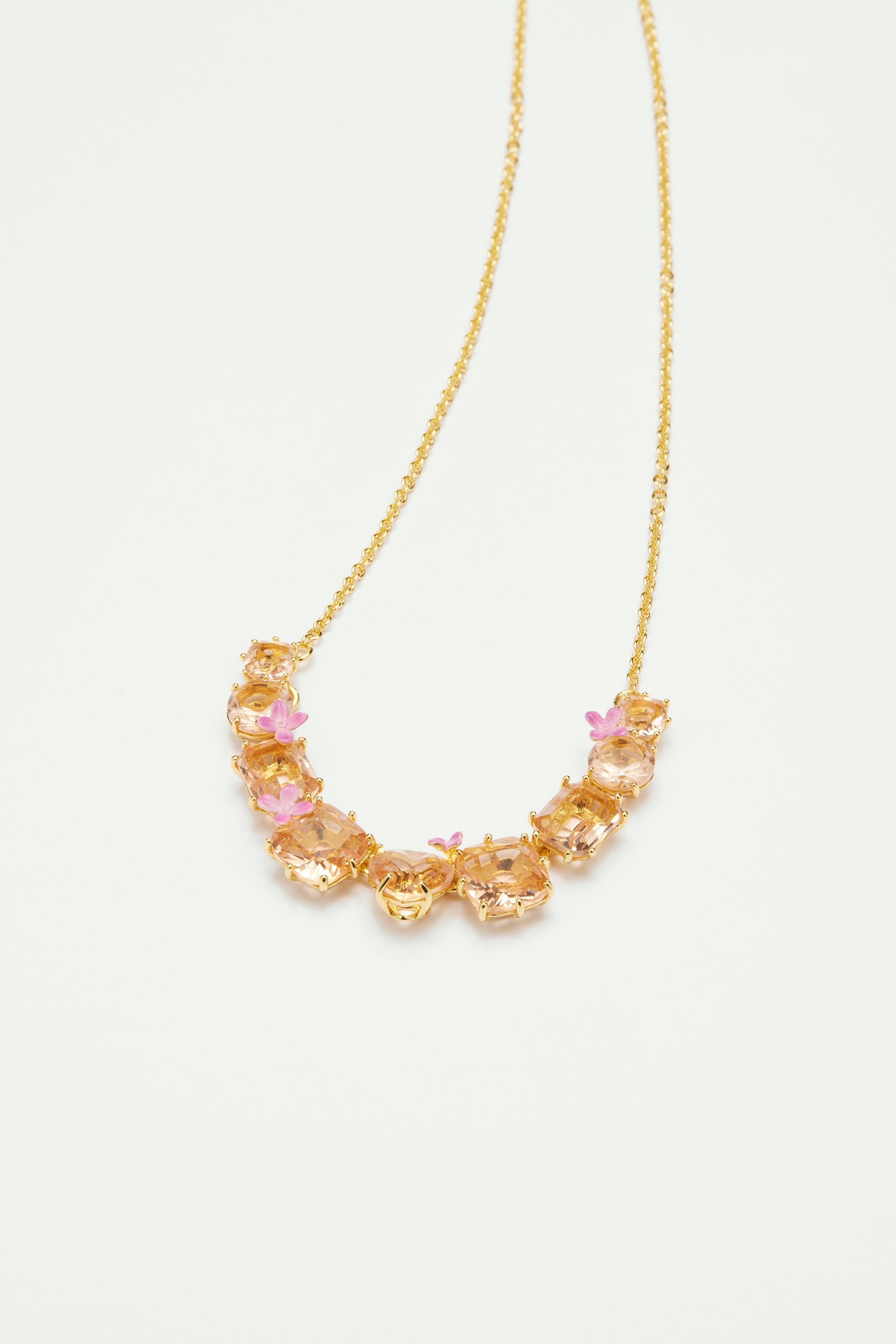 Apricot pink diamantine flower and 9 stone fine necklace