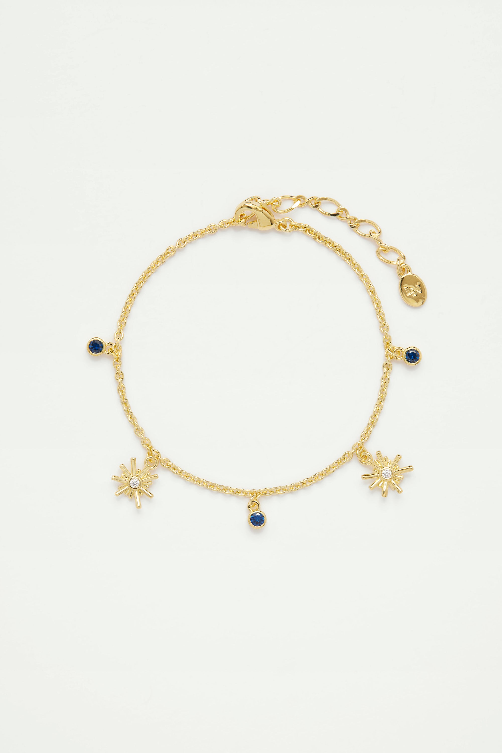 Bracelet charms étoiles dorées et pierre bleu nuit