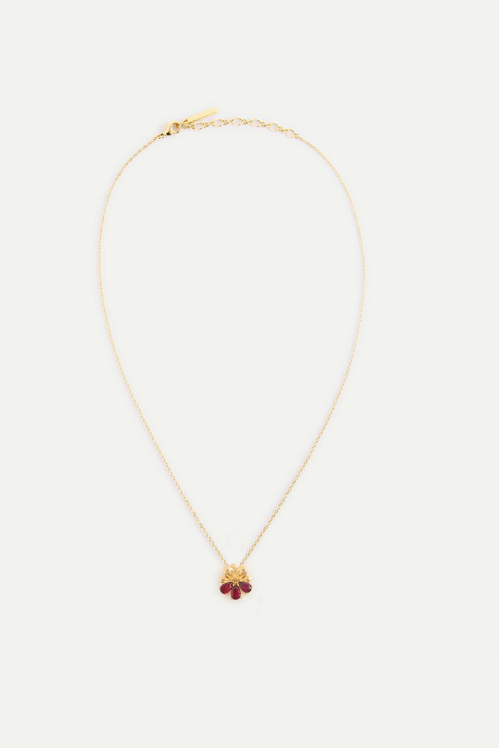 Collier pendentif doré cosmos et pierres rouges