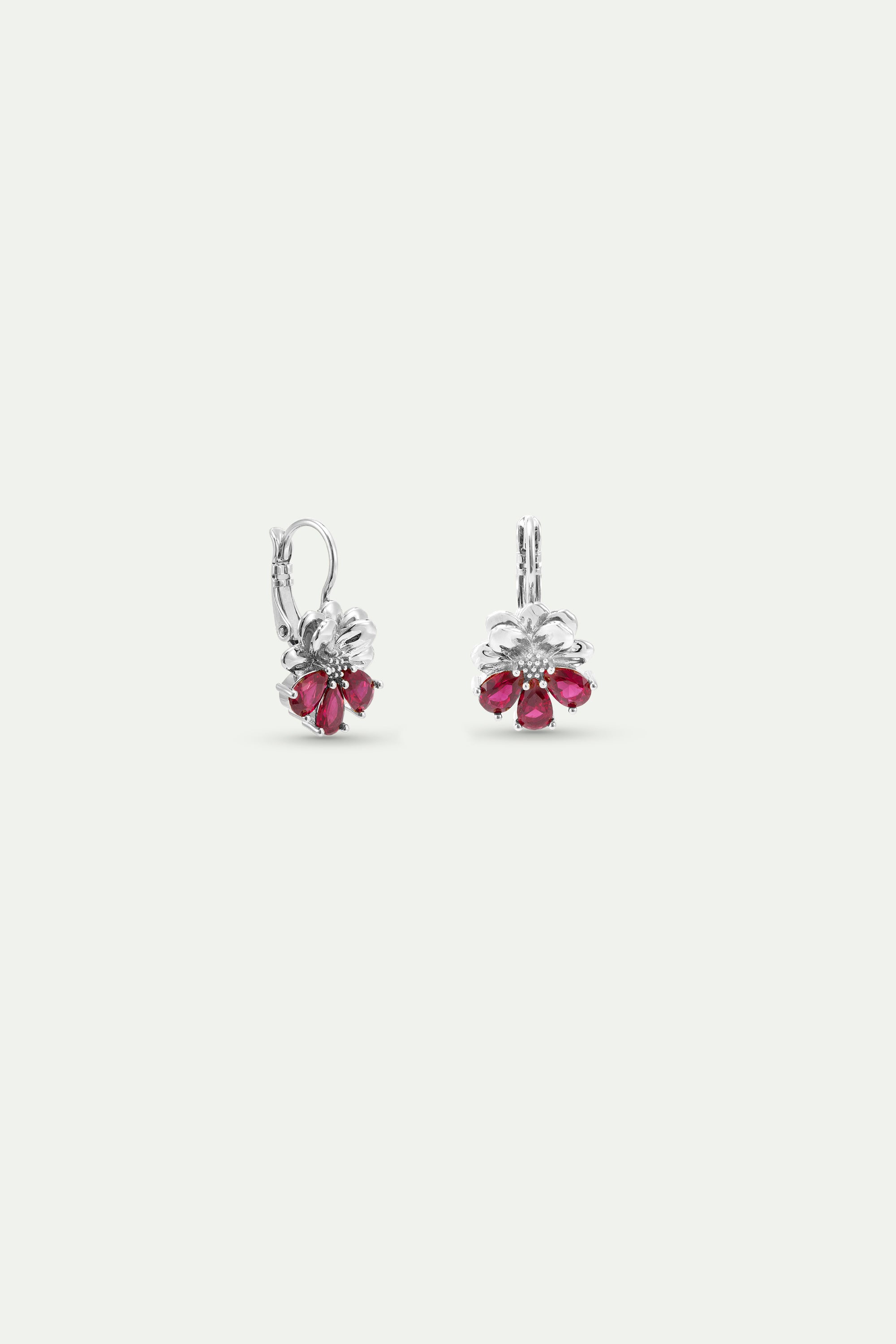 Silver sleeper earrings with cosmos and red stones