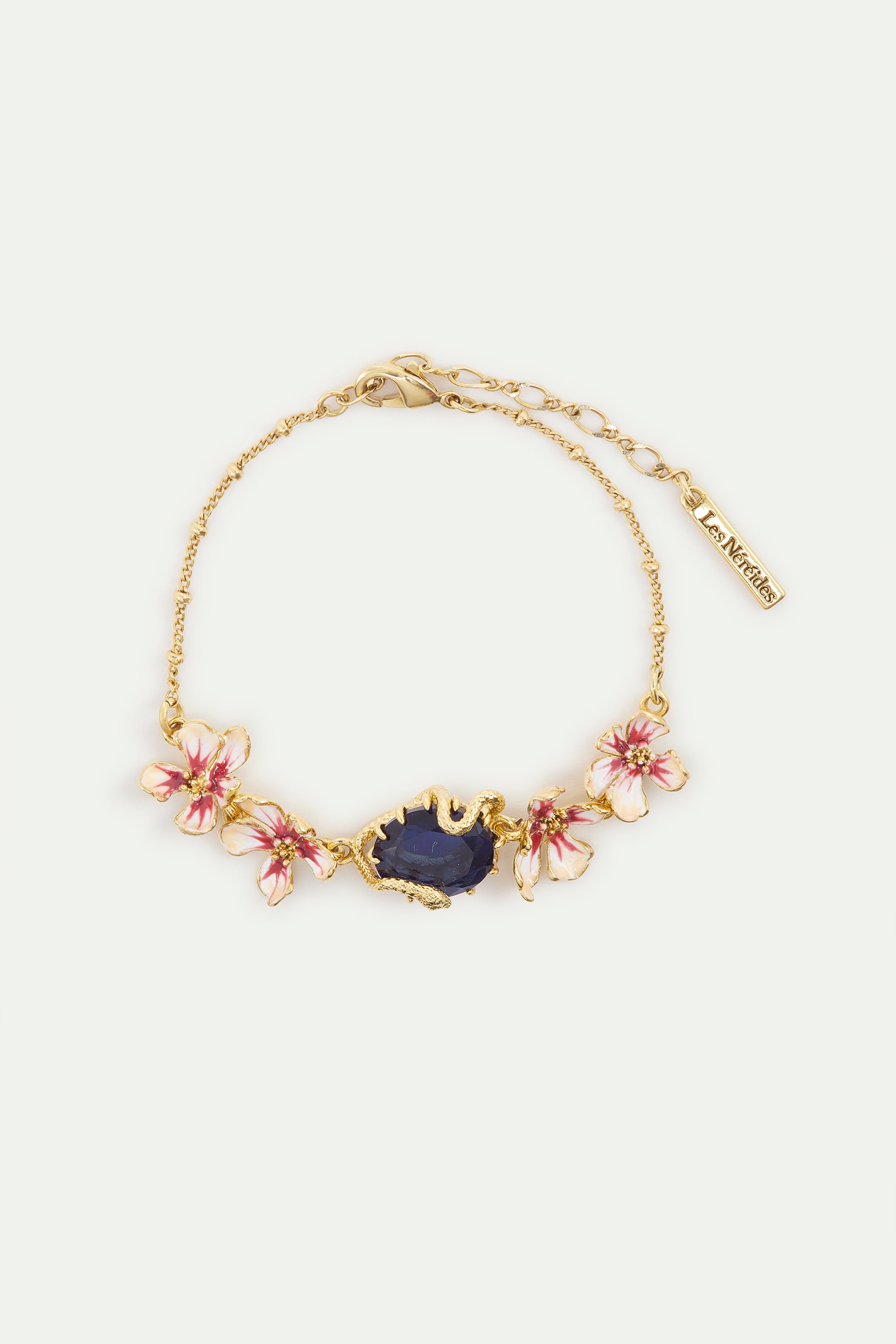 Bracelet pierre facettée bleue, serpent doré et fleurs de Mauve