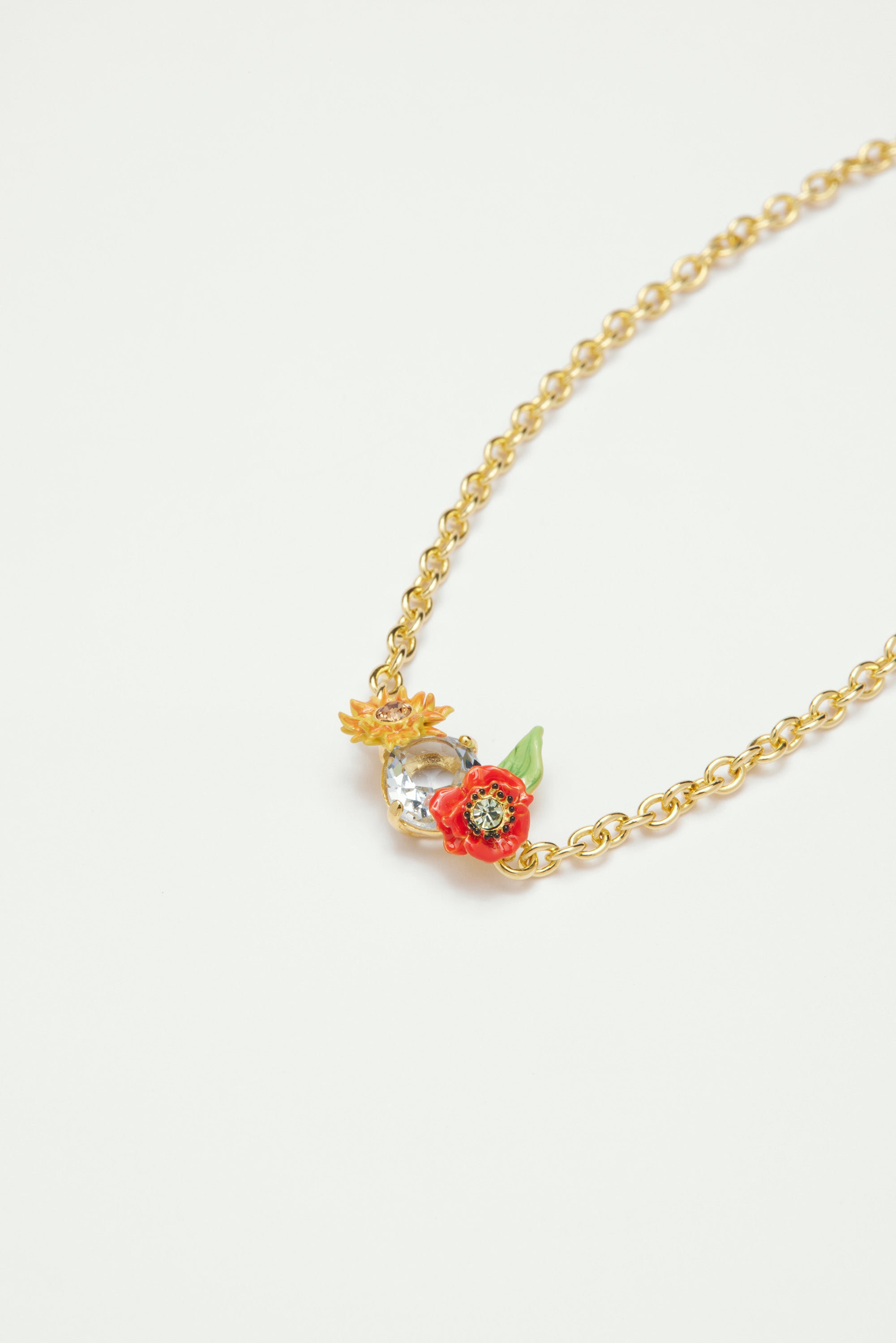 Bracelet fin coquelicots, fleur de tournesol et pierre en verre taillé bleu
