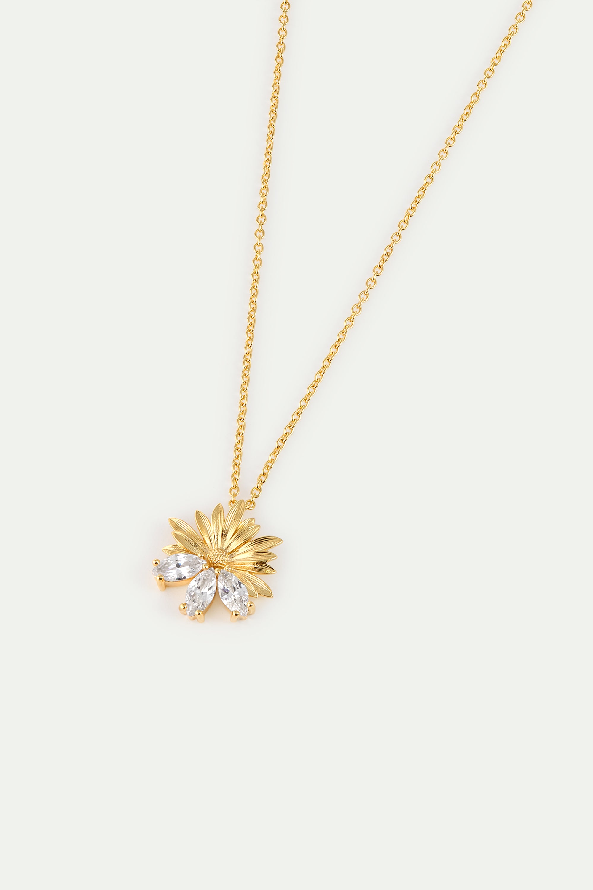 Gold pendant necklace with daisies and white stones