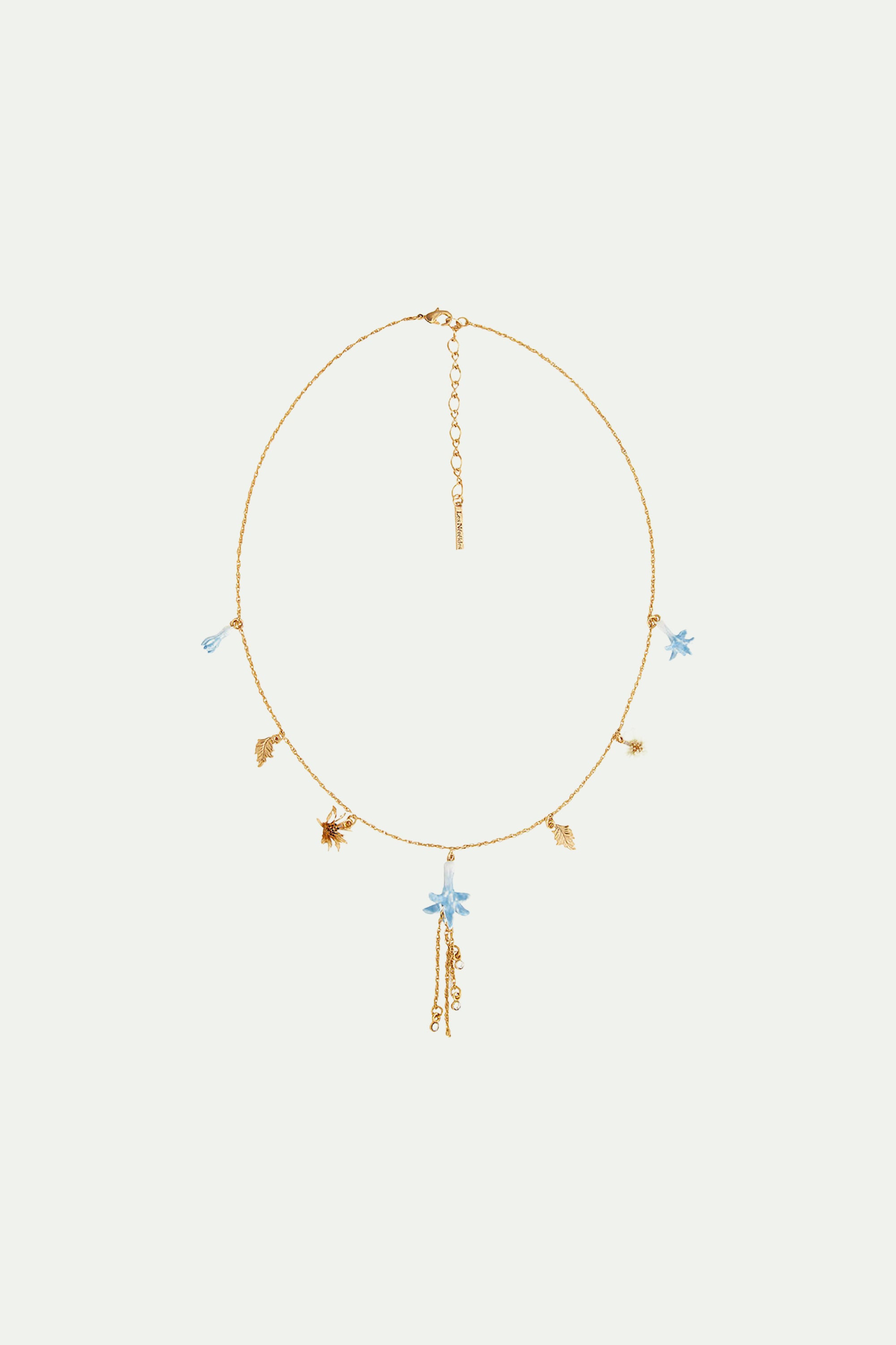 White, gold and blue flower pendant necklace