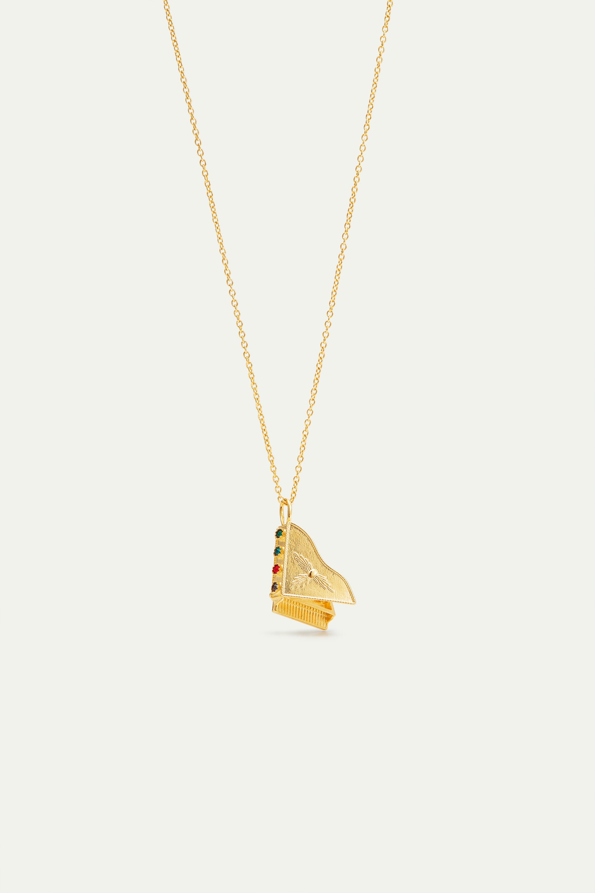 Collier pendentif piano doré