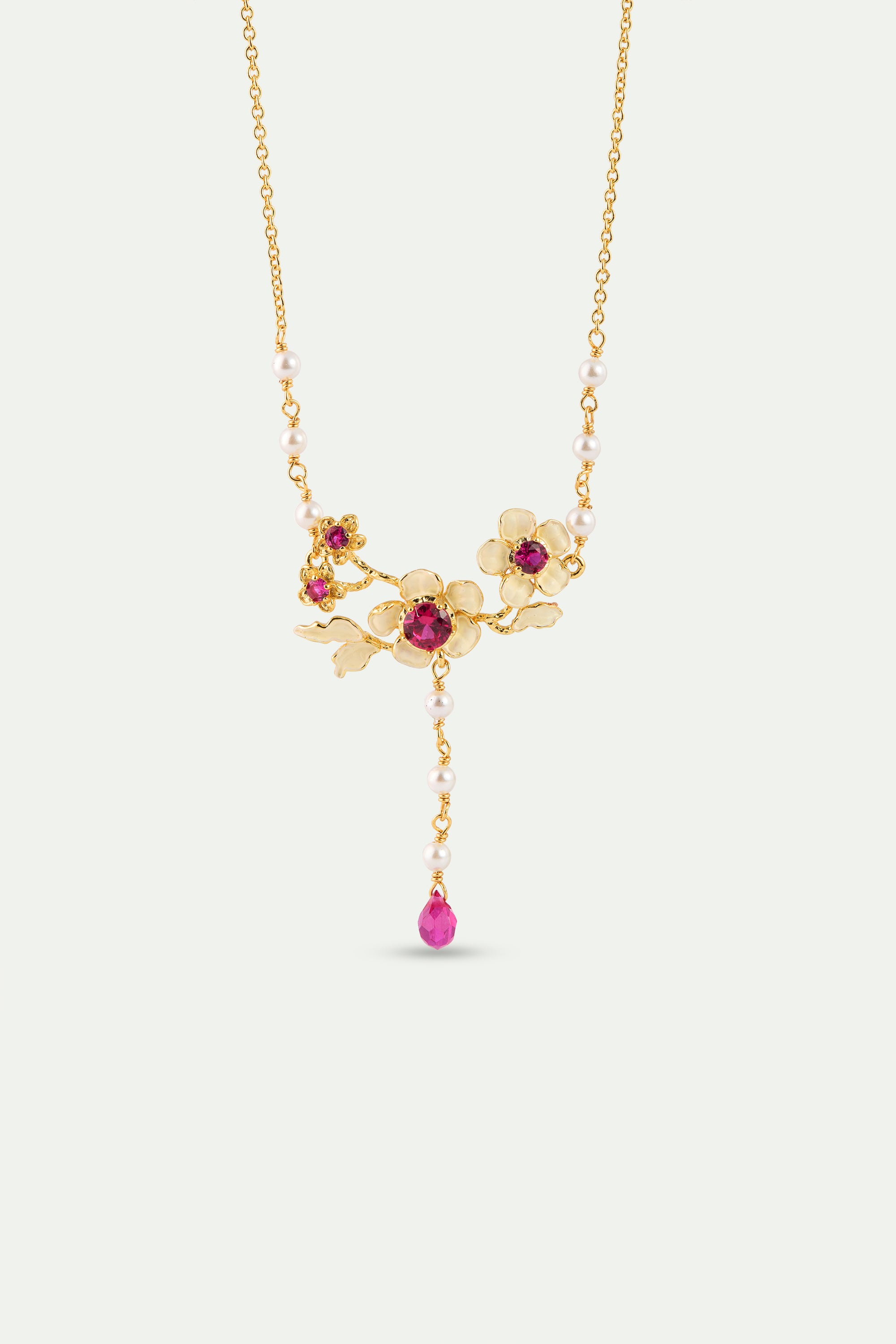 Collier plastron anémones dorées, cristaux roses et perles de culture