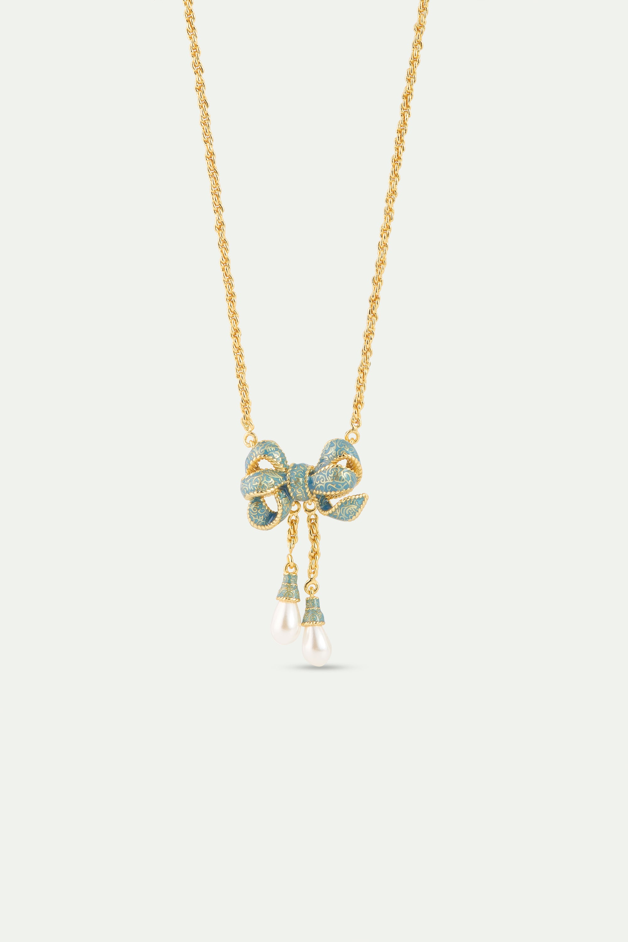 Collier pendentif nœud bleu et perles de culture