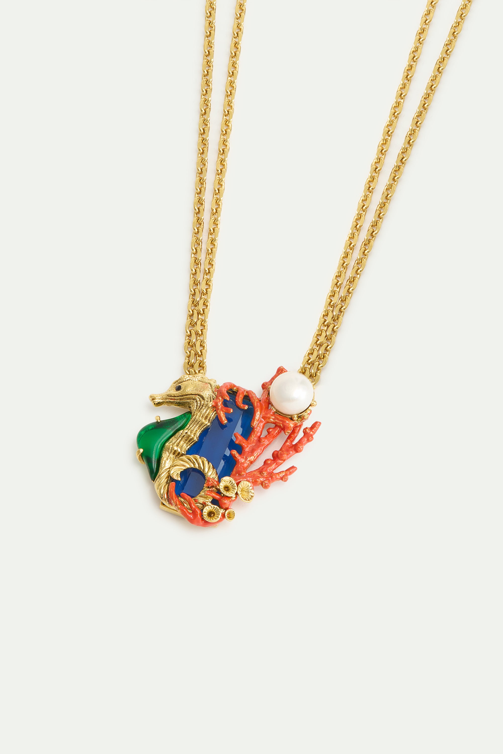 Collier pierre bleu marine et hippocampe vert et doré