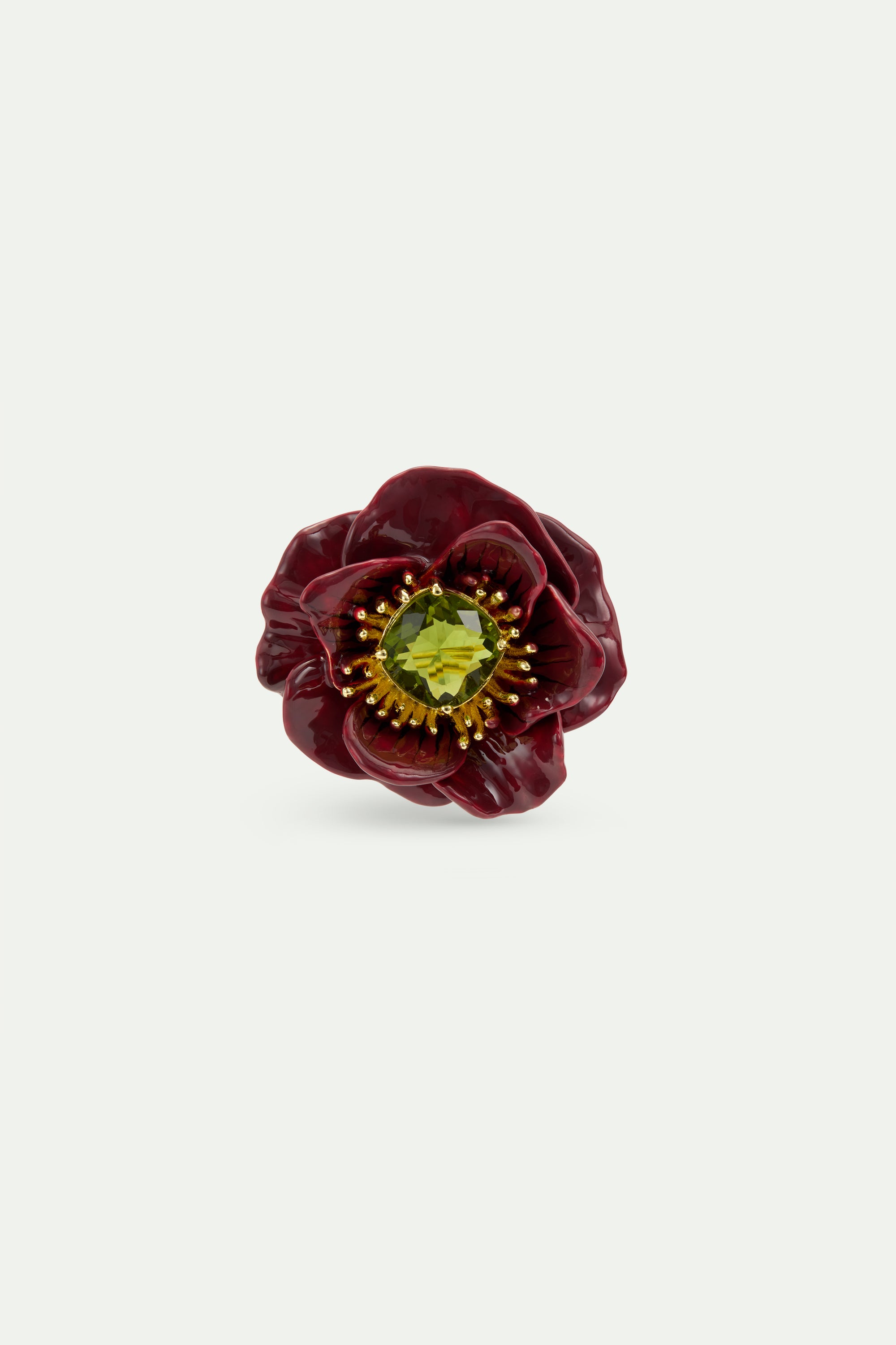 Broche flor de anémona burdeos y piedra facetada verde