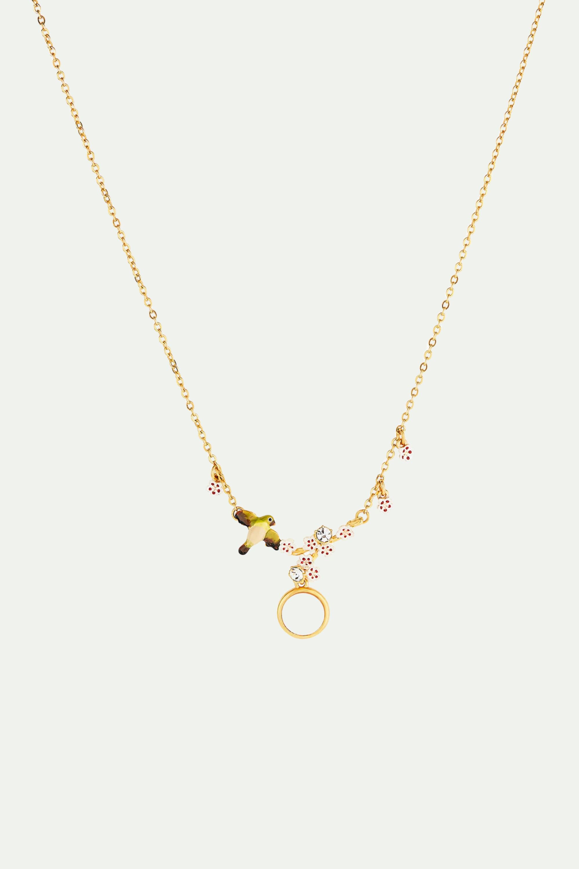 Collier plastron cabochon de nacre, oiseau, fleur de cerisier et cristaux