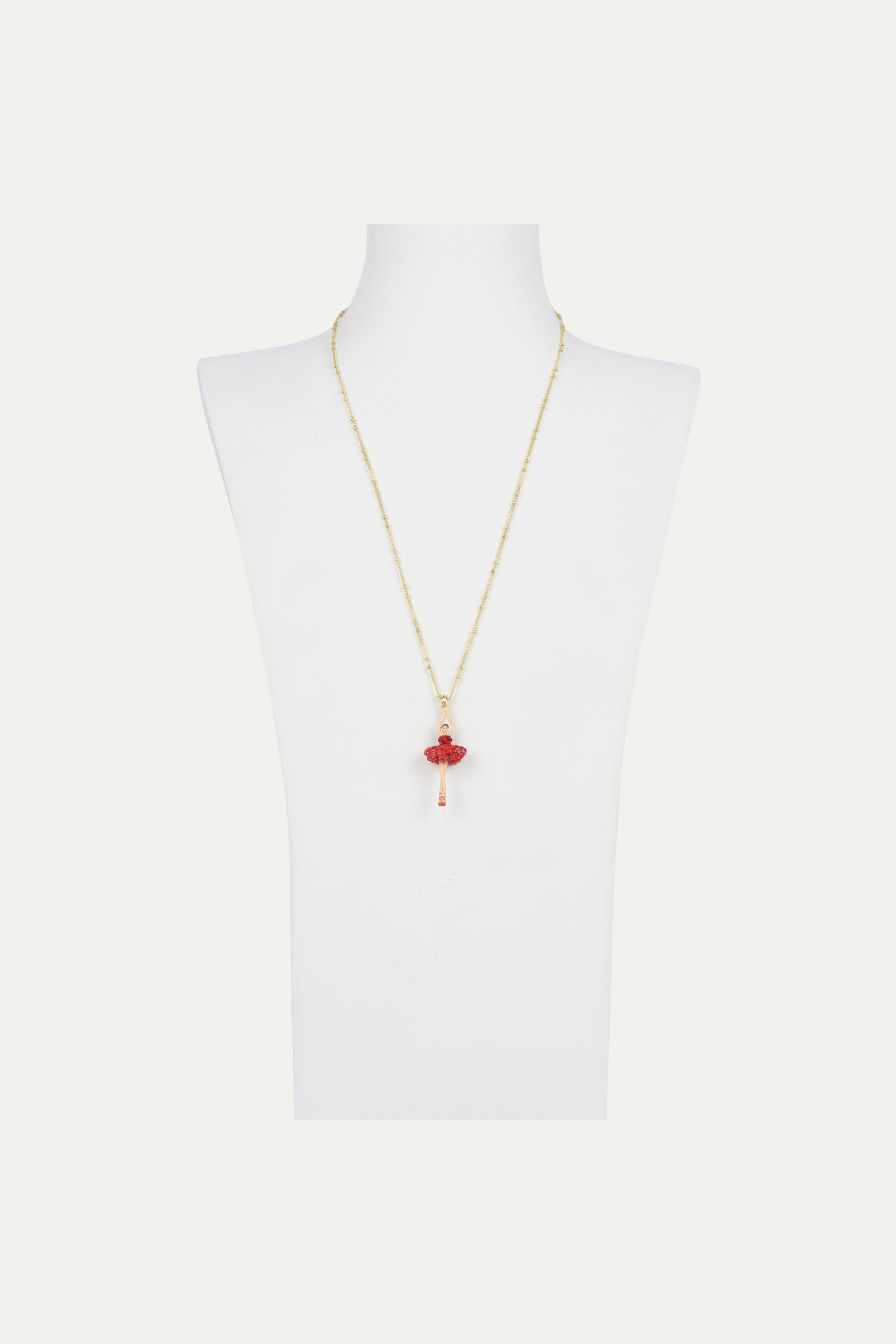 Necklace featuring ballerina with tutu paved with red rhinestone