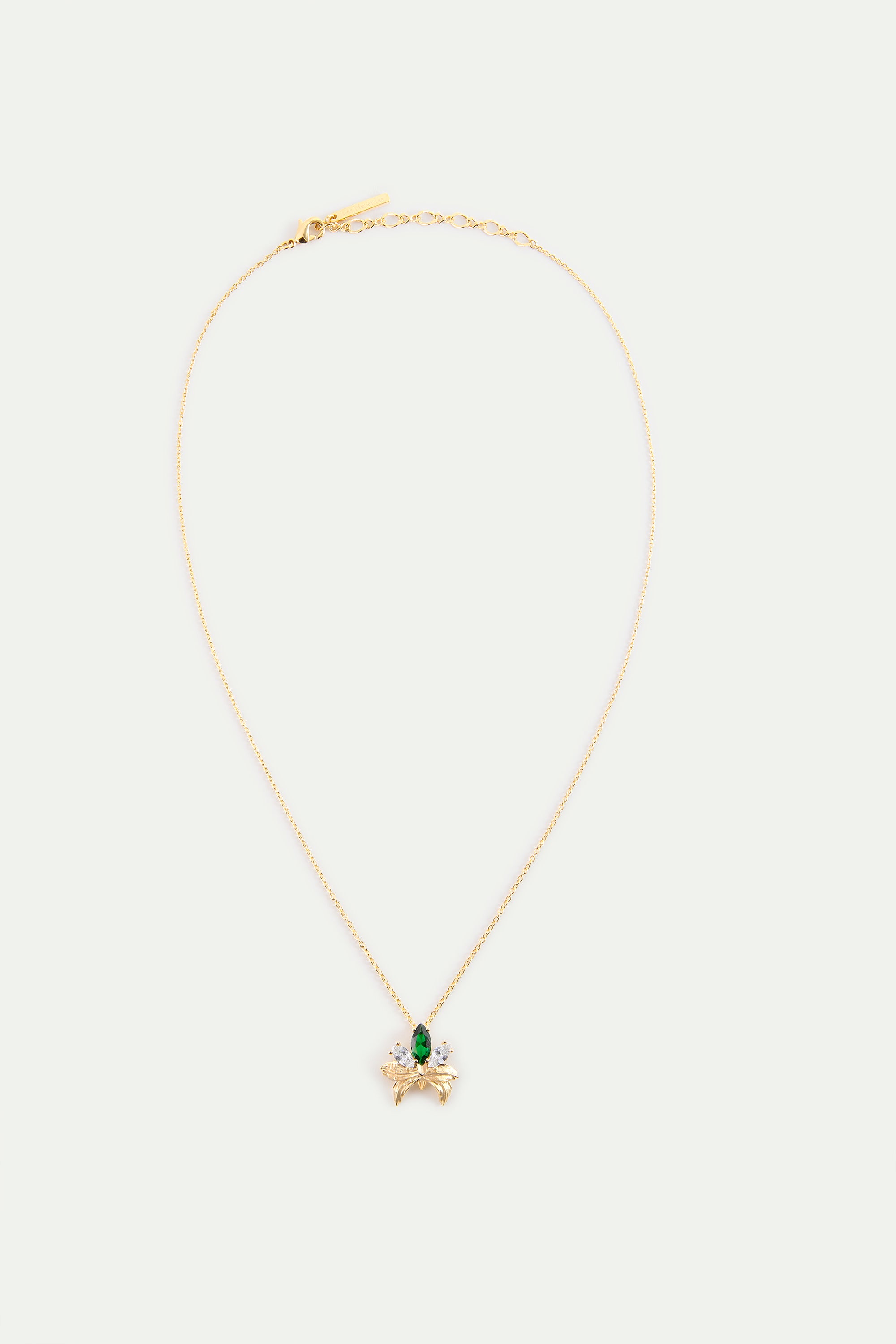 Collier pendentif doré orchidée et pierres blanches et verte
