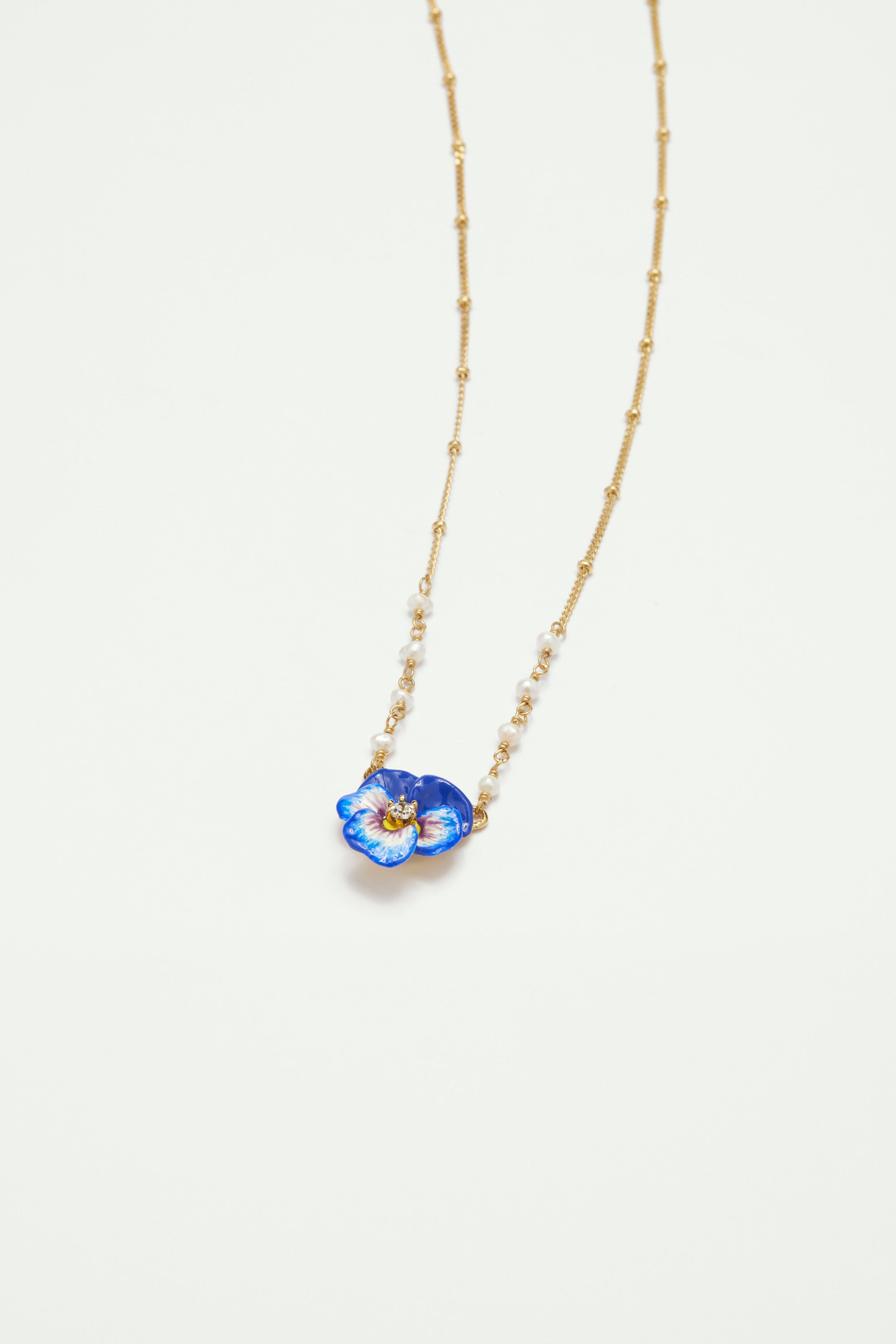 Collier pendentif pensée bleue et cristal taillé
