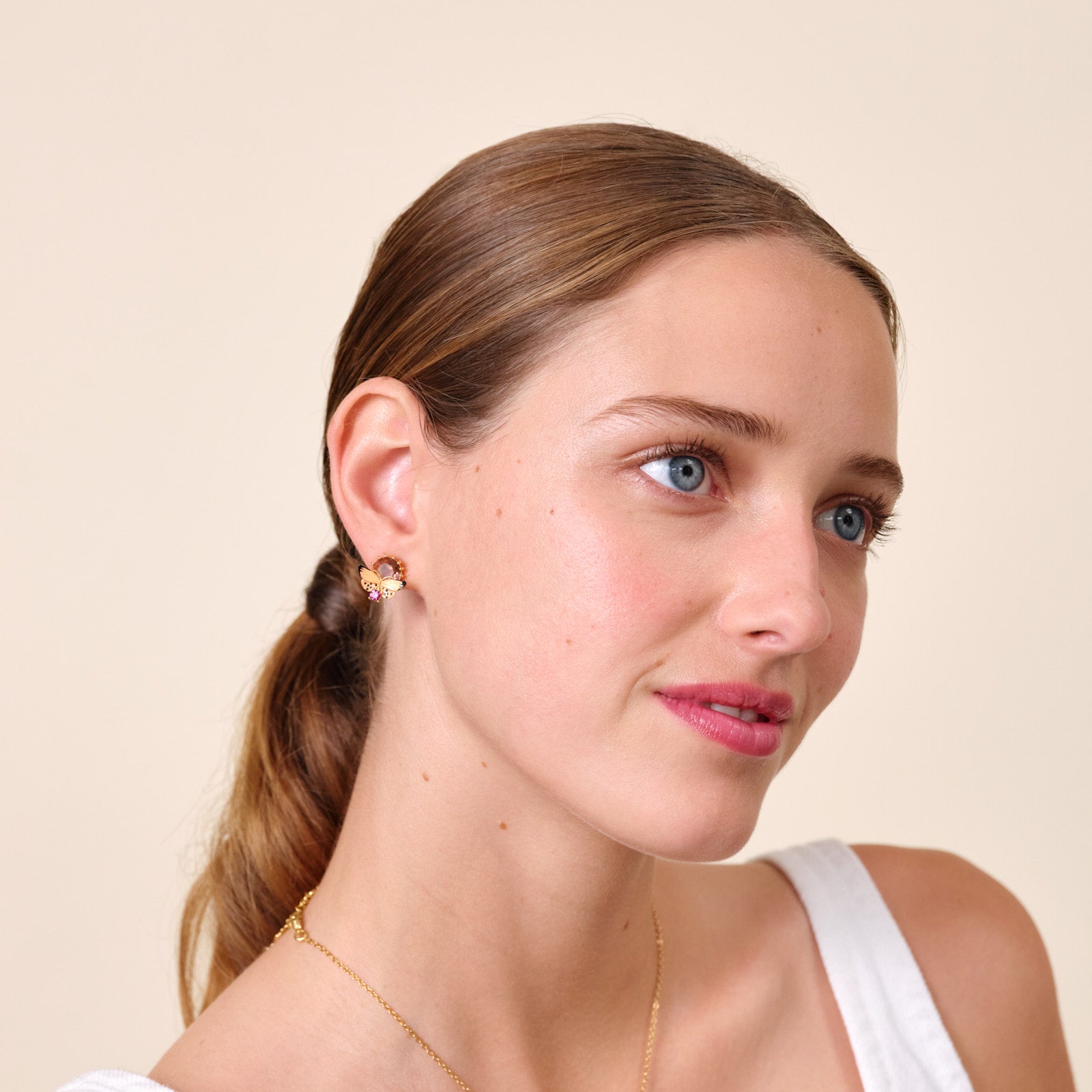 Boucles d'oreilles papillon et pierres rondes