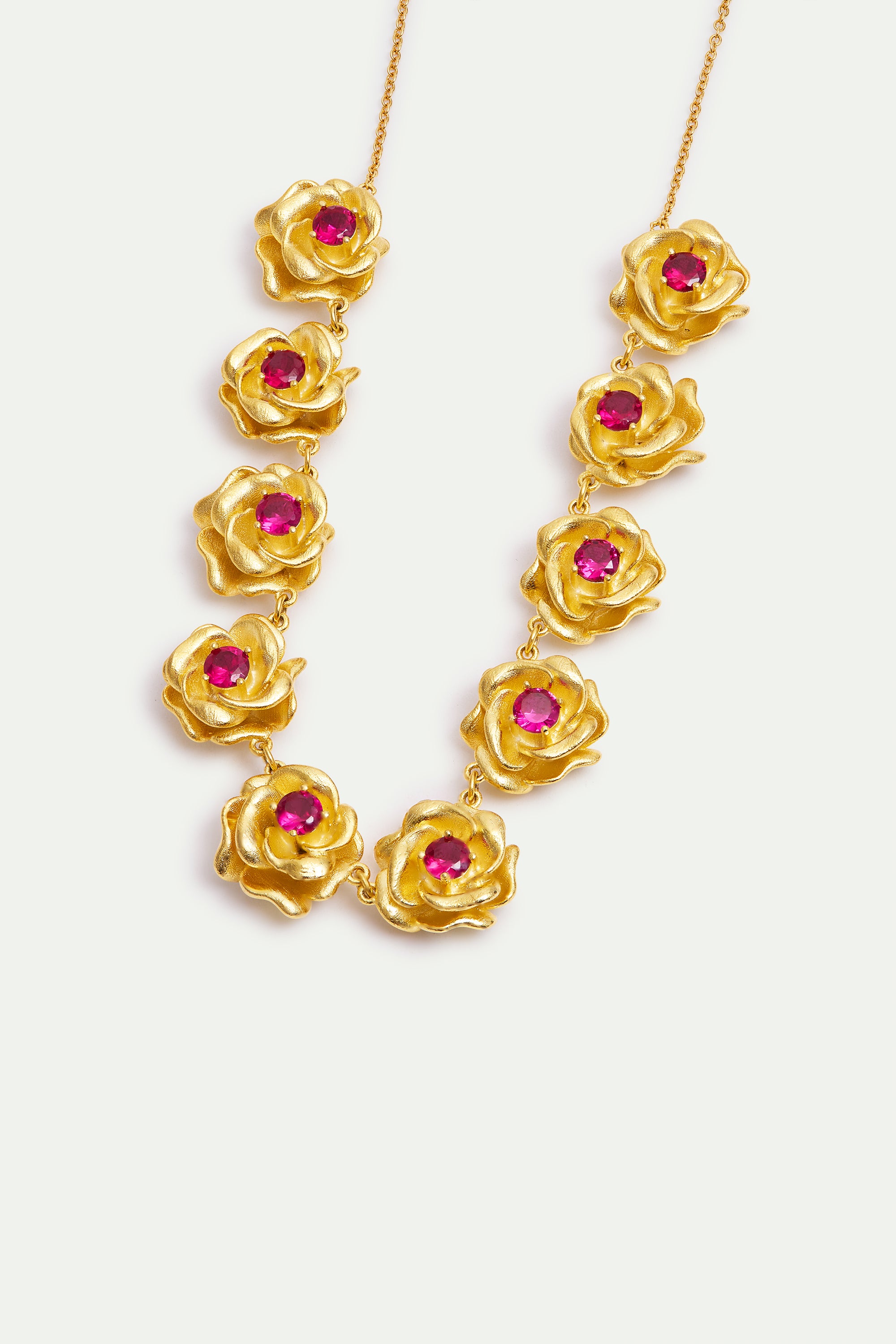 Necklace with gold Mona Lisa roses and pink stones