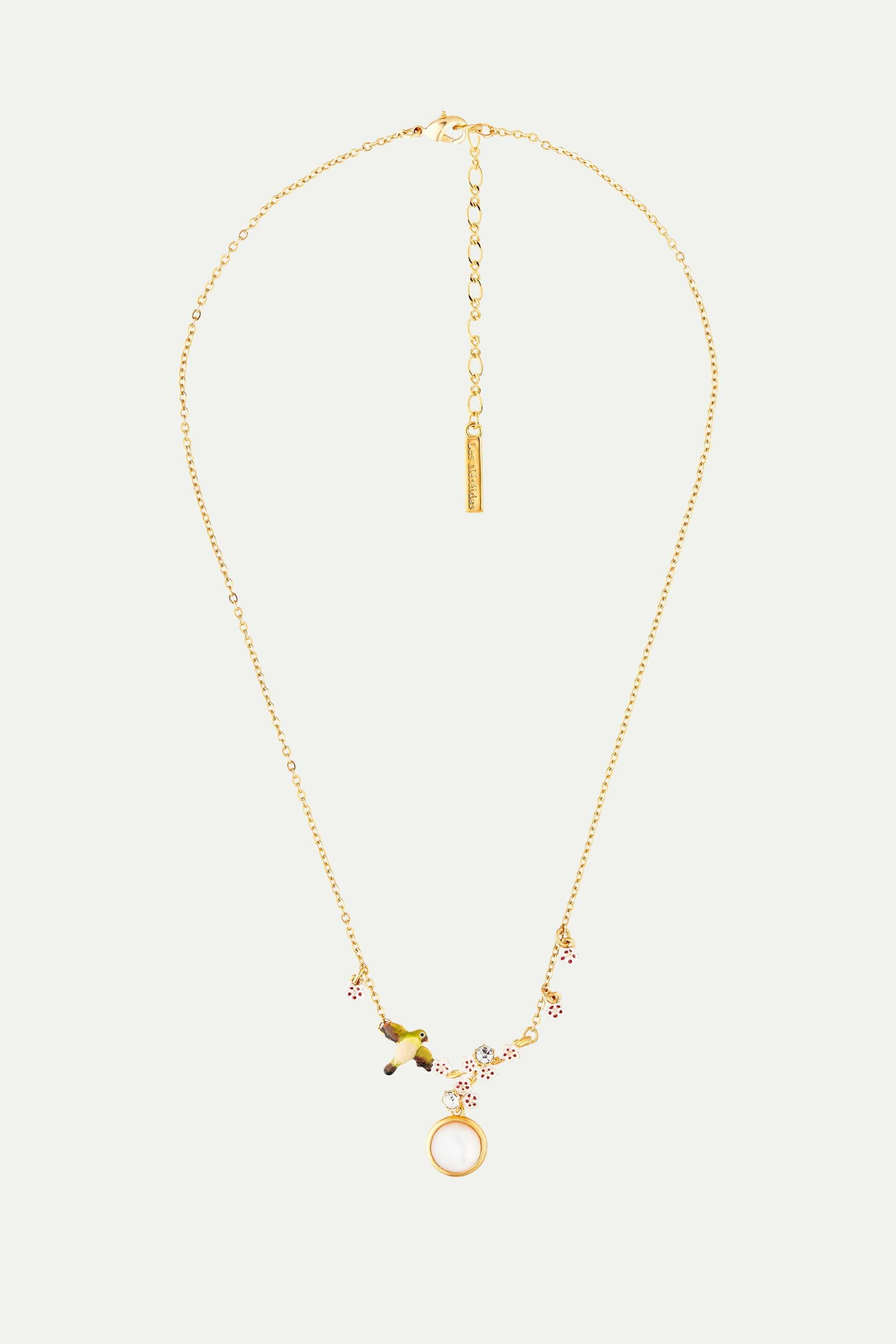 Collier plastron cabochon de nacre, oiseau, fleur de cerisier et cristaux